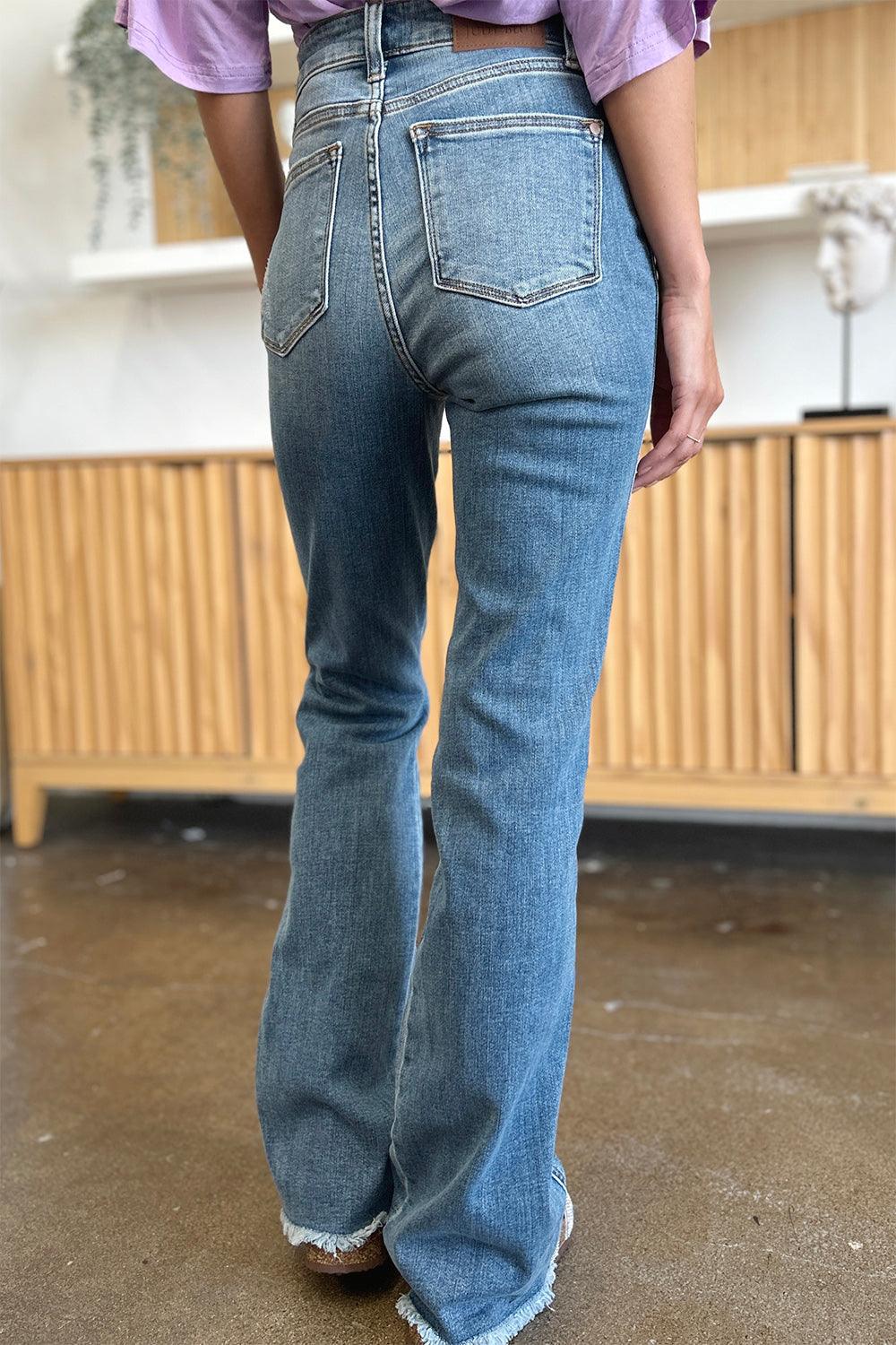 Get trendy with Full Size Distressed Raw Hem Bootcut Jeans - Plus Size available at Styles Code. Grab yours today!