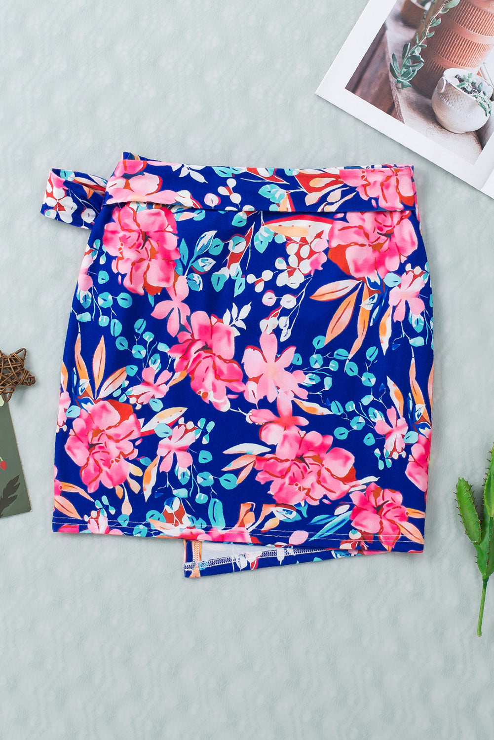 Get trendy with Floral Tied Mini Skirt - Skirts available at Styles Code. Grab yours today!
