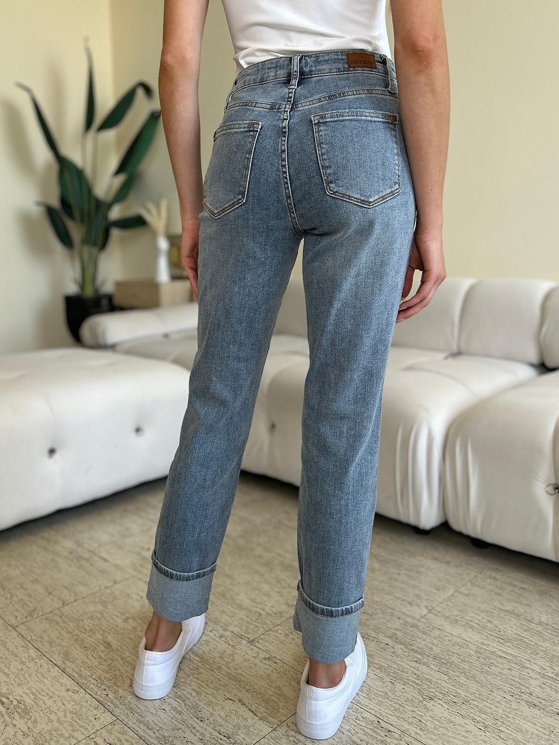 Get trendy with Full Size High Waist Cuff Hem Jeans - Plus Size available at Styles Code. Grab yours today!