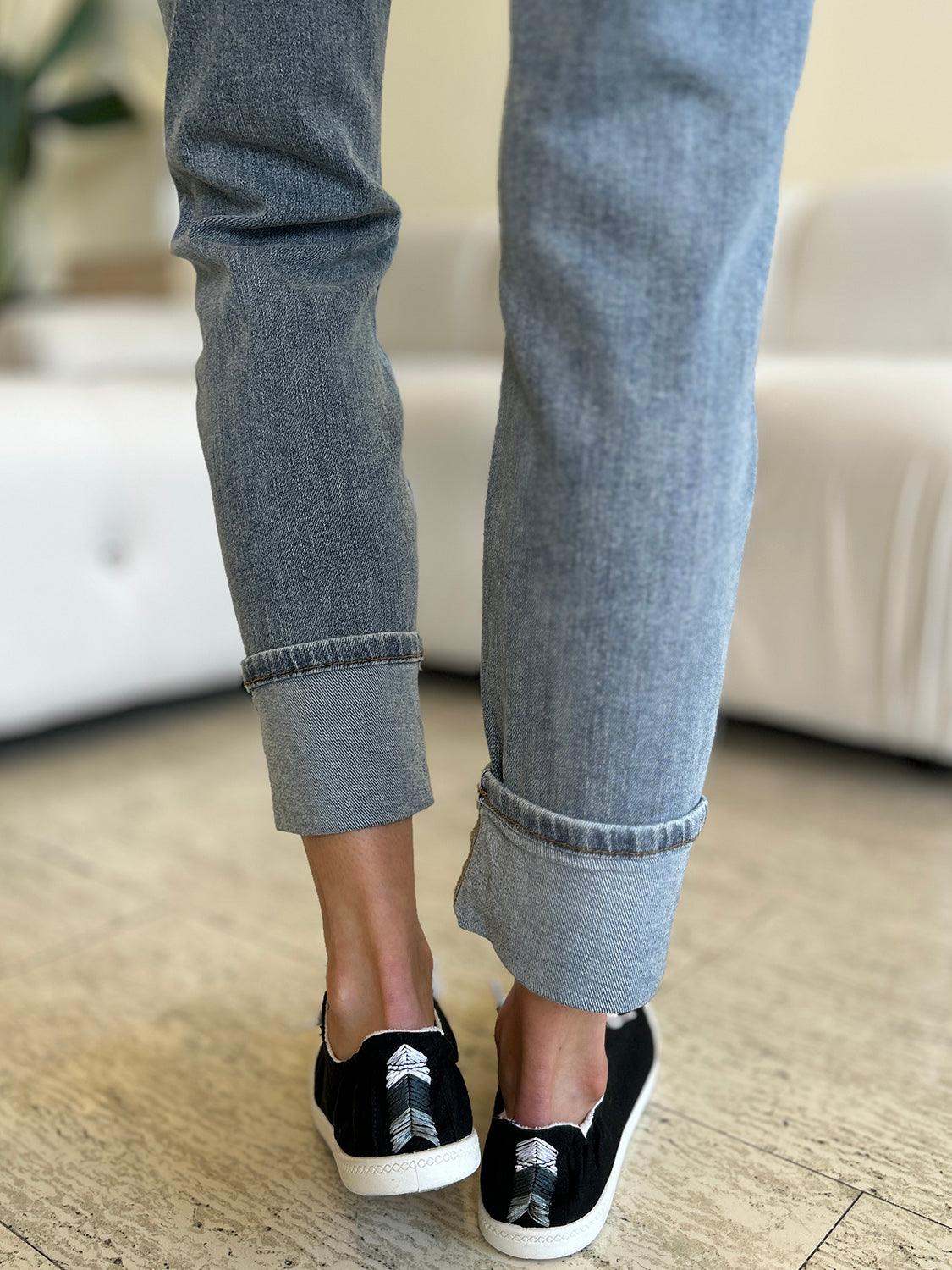 Get trendy with Full Size High Waist Cuff Hem Jeans - Plus Size available at Styles Code. Grab yours today!