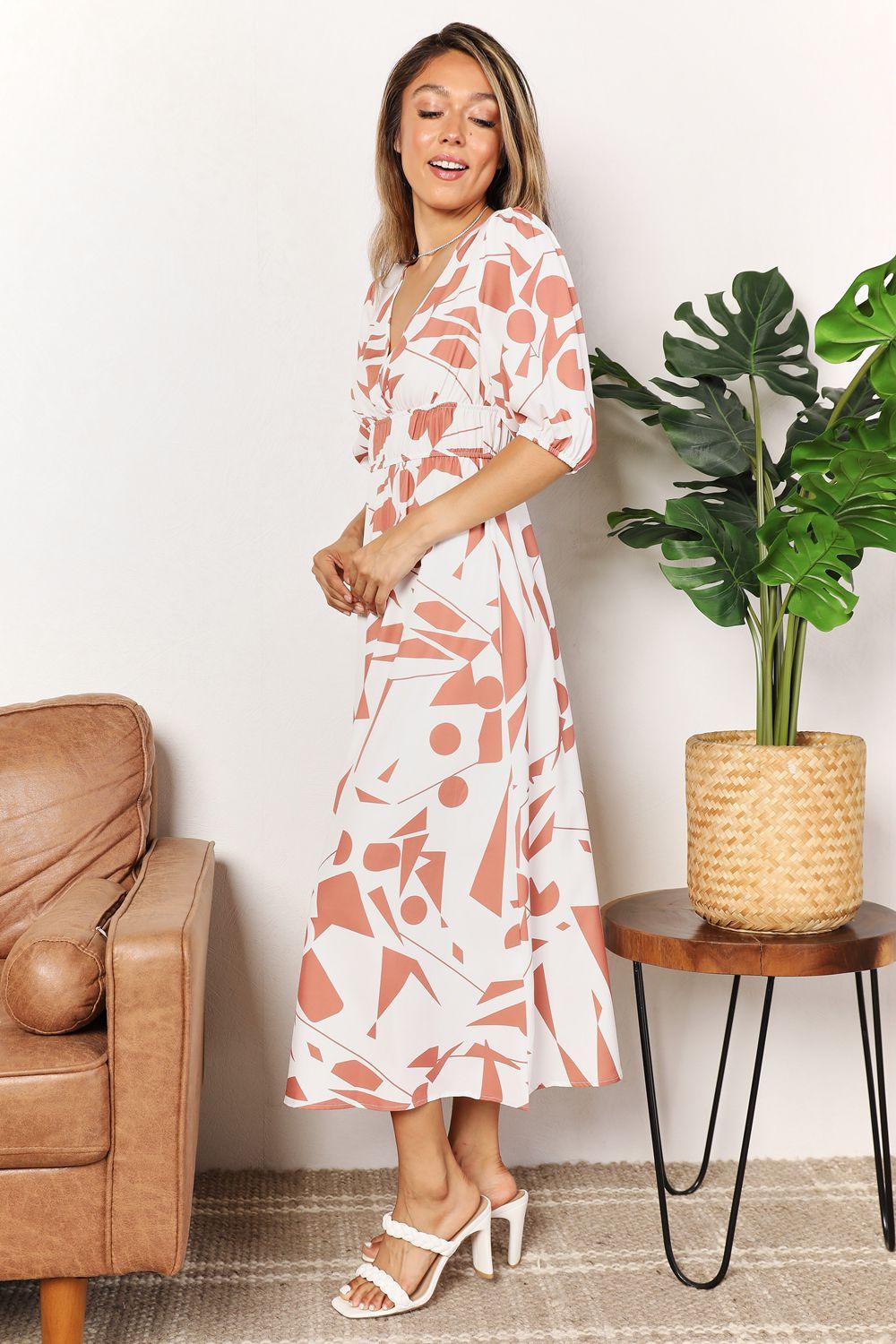 Get trendy with Printed Surplice Balloon Sleeve Dress - Dress available at Styles Code. Grab yours today!