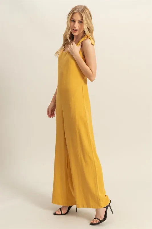 Get trendy with Cutout Wide Leg Jumpsuit - Jumpsuit available at Styles Code. Grab yours today!