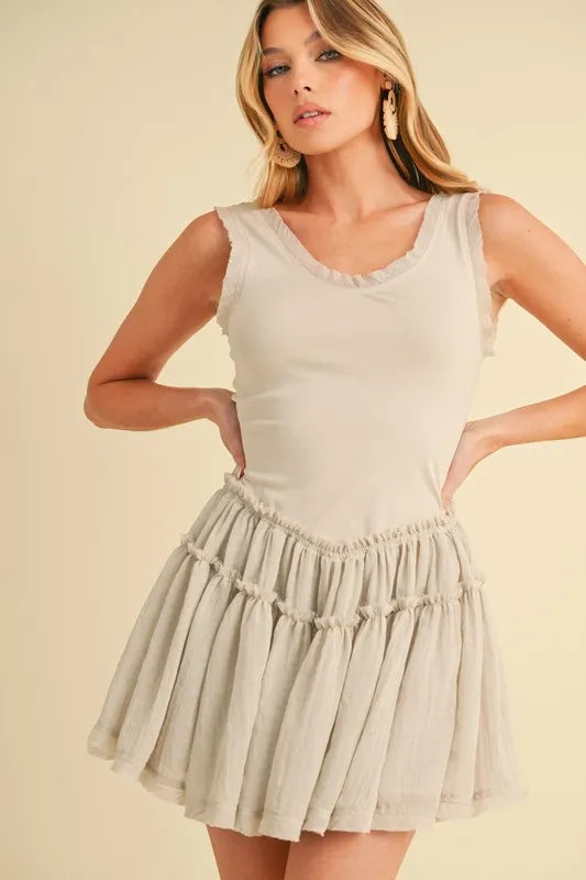 Get trendy with Frill Drop Waist Mini Dress - Dress available at Styles Code. Grab yours today!