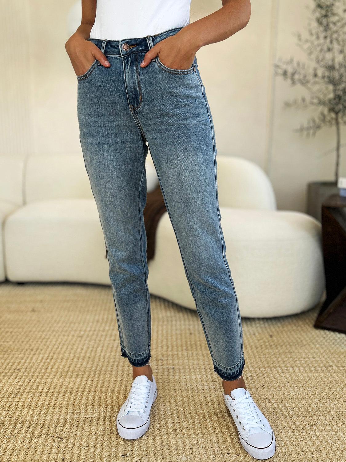 Get trendy with Full Size Mid Rise Hem Jeans - Plus Size available at Styles Code. Grab yours today!