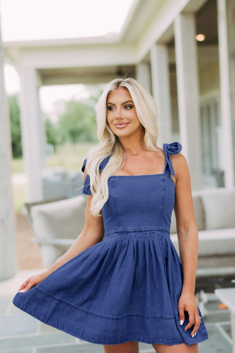 Get trendy with Square Neck Tie Shoulder Denim Dress - Denim Dress available at Styles Code. Grab yours today!