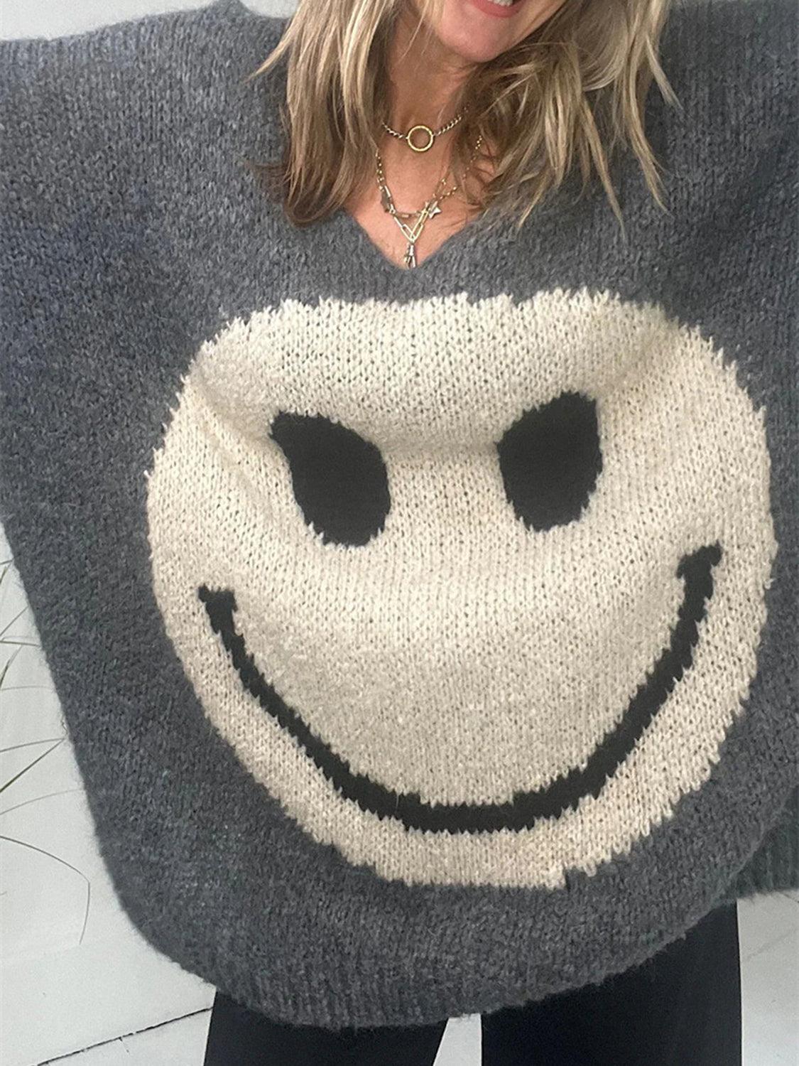Get trendy with Smiling Face V-Neck Long Sleeve Sweater - available at Styles Code. Grab yours today!