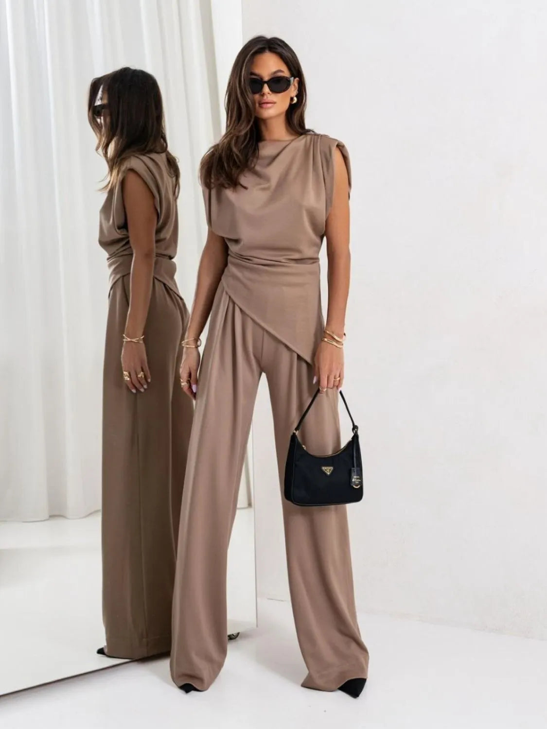 Get trendy with Slit Ruched Top and Wide Leg Pants Set - Two Piece Sets available at Styles Code. Grab yours today!