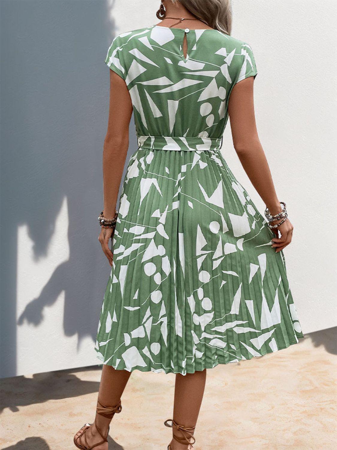 Get trendy with Tied Pleated Printed Cap Sleeve Dress - Dress available at Styles Code. Grab yours today!