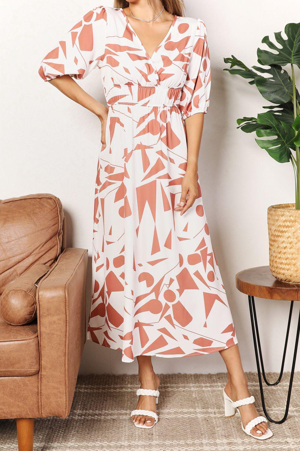 Get trendy with Printed Surplice Balloon Sleeve Dress - Dress available at Styles Code. Grab yours today!