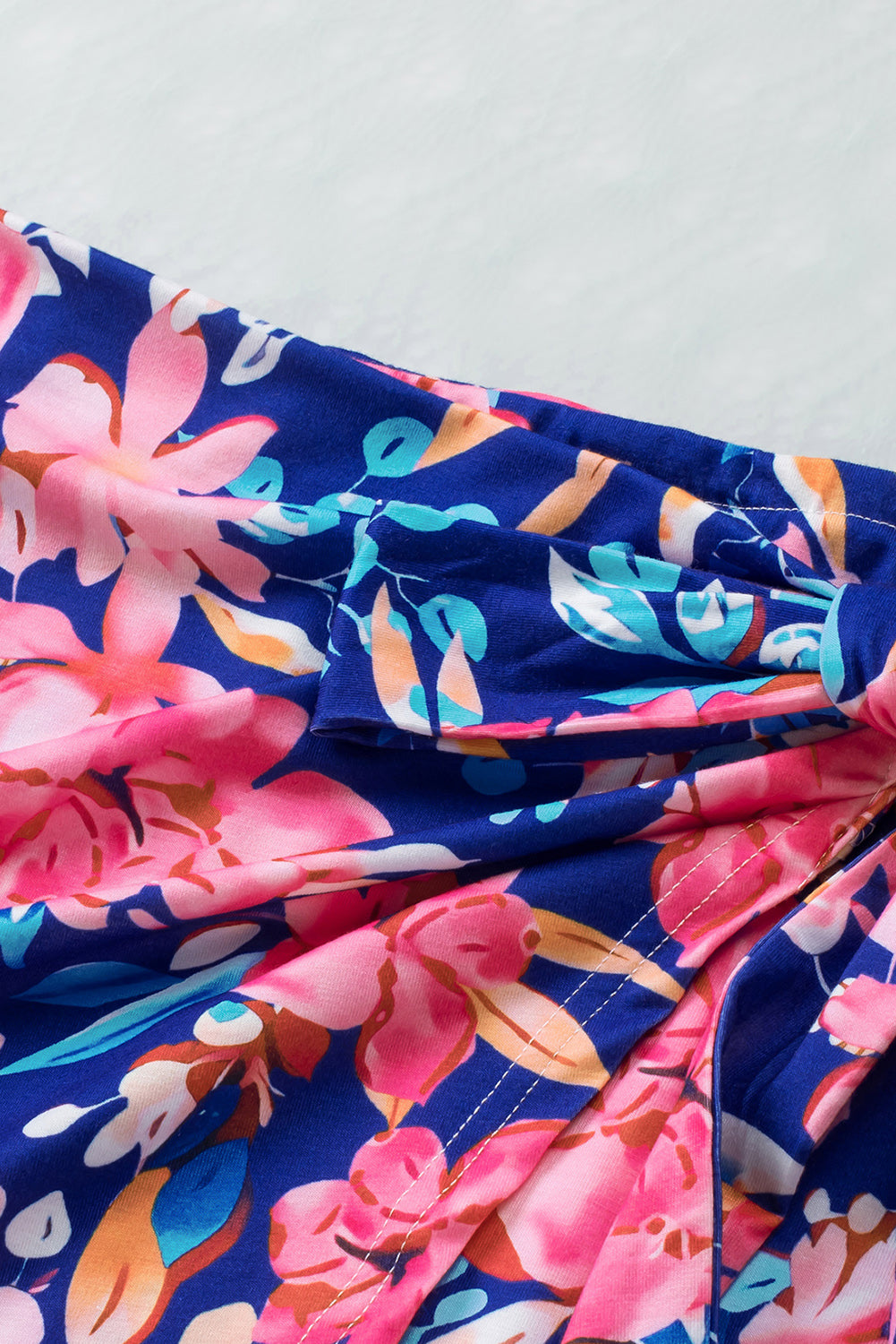Get trendy with Floral Tied Mini Skirt - Skirts available at Styles Code. Grab yours today!