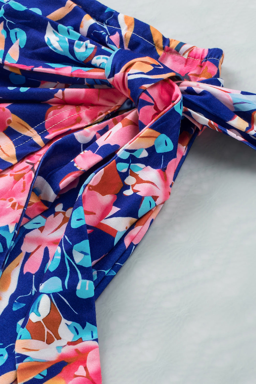 Get trendy with Floral Tied Mini Skirt - Skirts available at Styles Code. Grab yours today!
