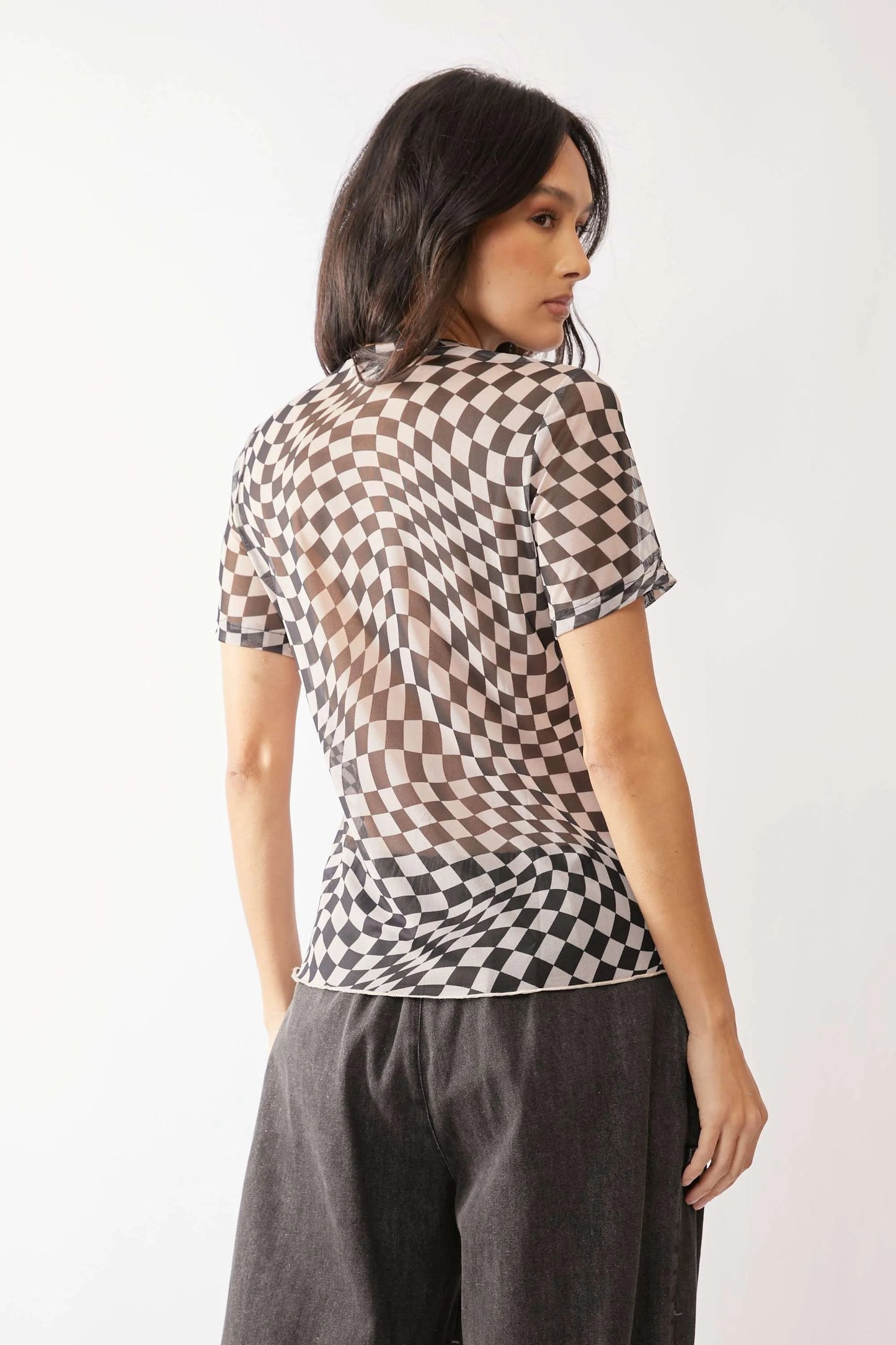 Get trendy with Checker Board Printed Mesh Top - Top available at Styles Code. Grab yours today!
