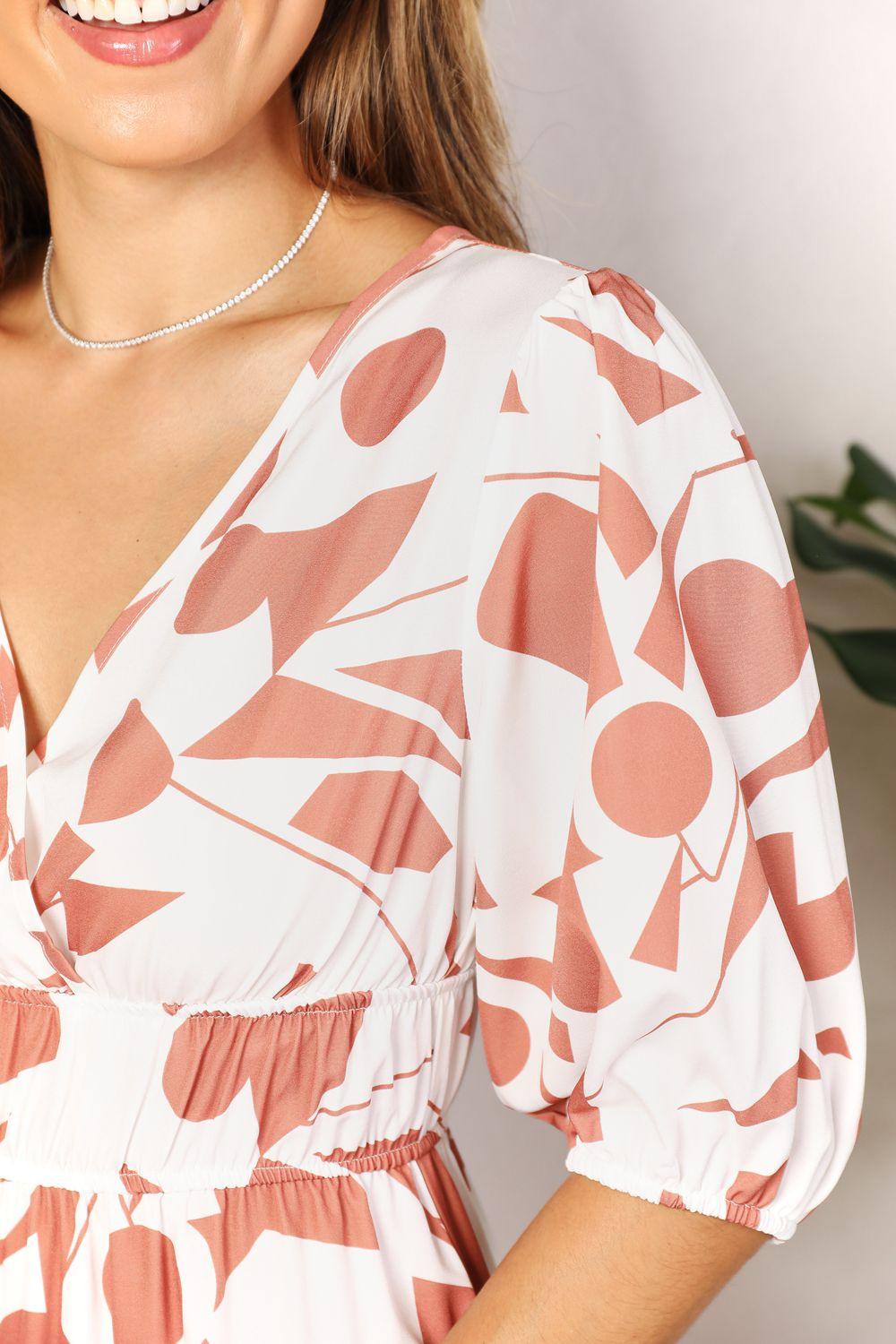 Get trendy with Printed Surplice Balloon Sleeve Dress - Dress available at Styles Code. Grab yours today!