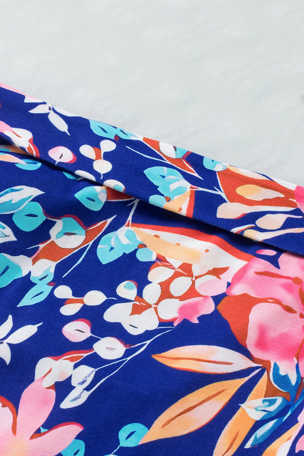 Get trendy with Floral Tied Mini Skirt - Skirts available at Styles Code. Grab yours today!