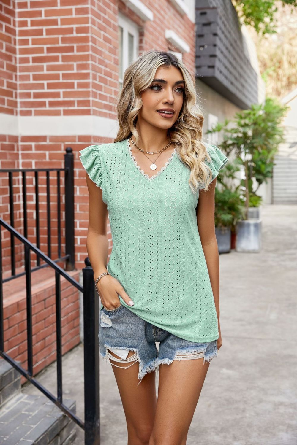 Get trendy with Flutter Sleeve Scalloped V-Neck Top - Blouse available at Styles Code. Grab yours today!