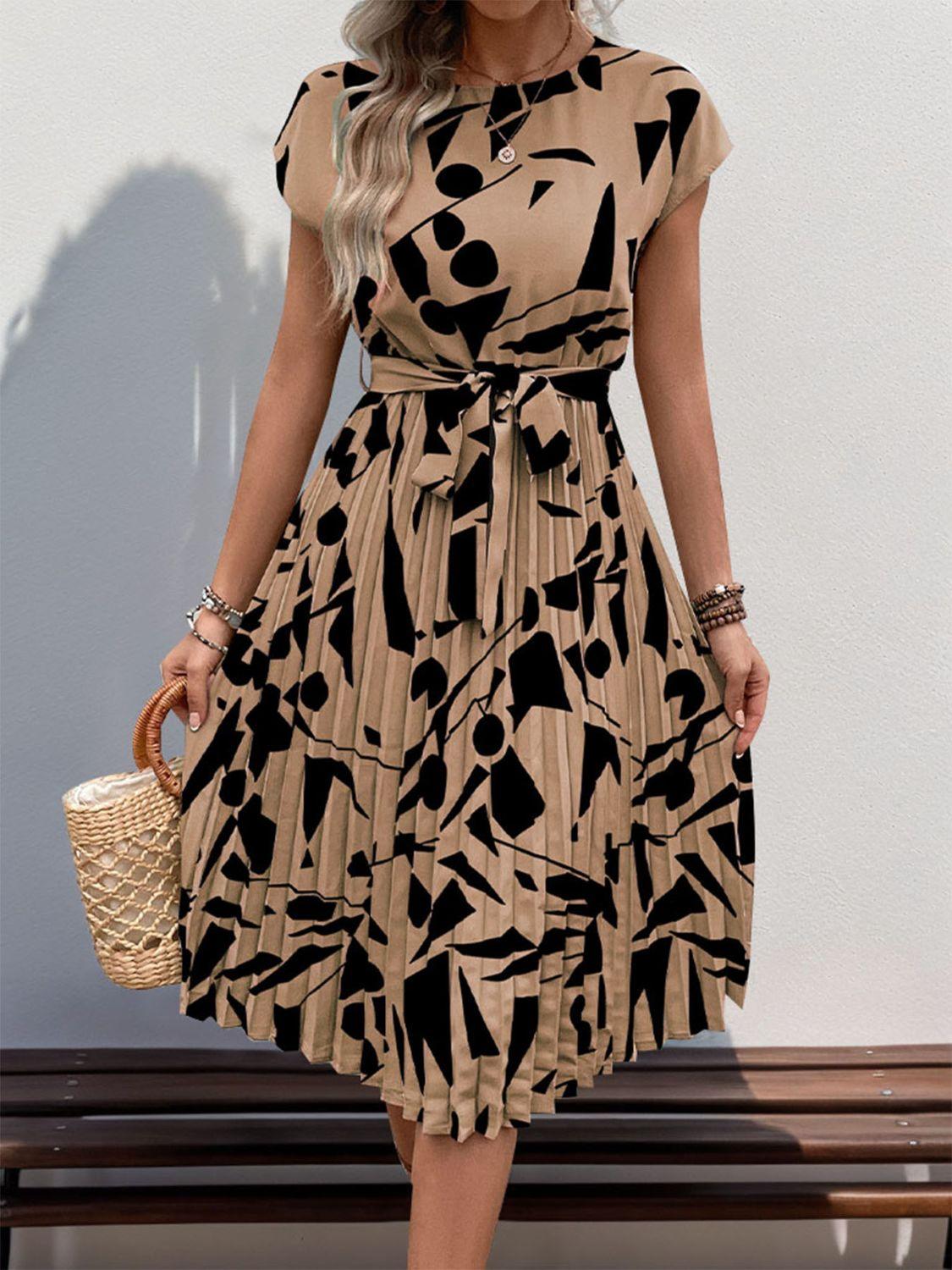 Get trendy with Tied Pleated Printed Cap Sleeve Dress - Dress available at Styles Code. Grab yours today!