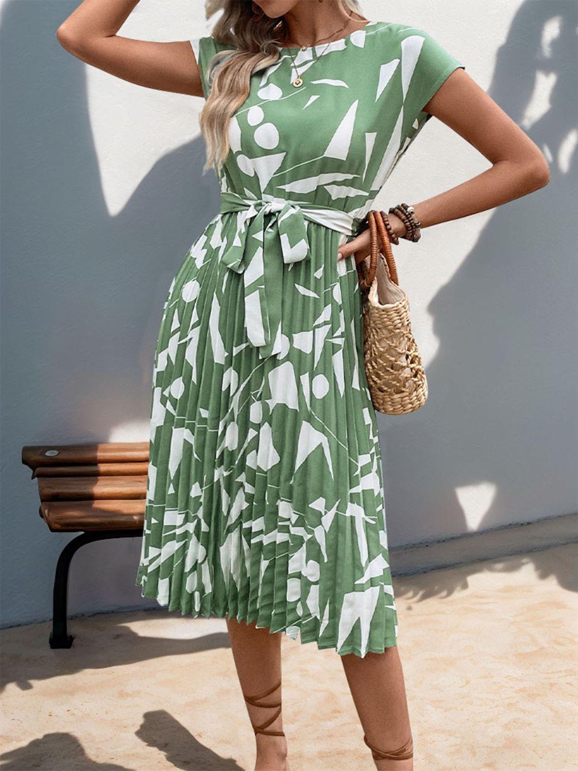 Get trendy with Tied Pleated Printed Cap Sleeve Dress - Dress available at Styles Code. Grab yours today!