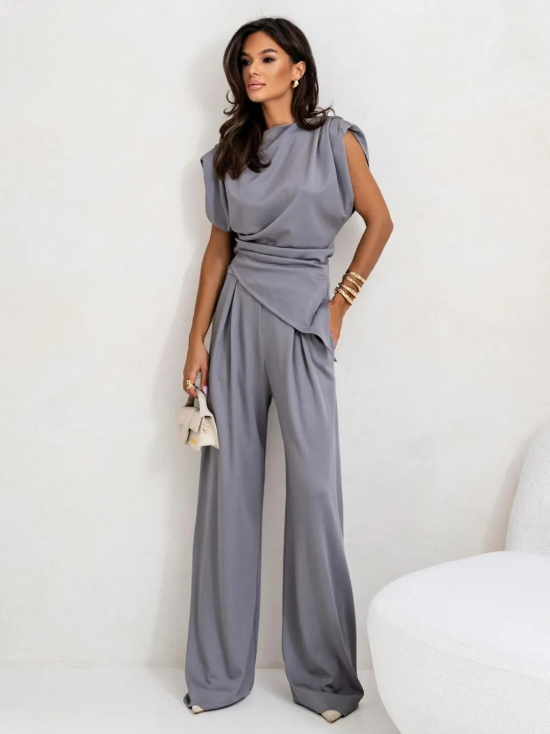 Get trendy with Slit Ruched Top and Wide Leg Pants Set - Two Piece Sets available at Styles Code. Grab yours today!