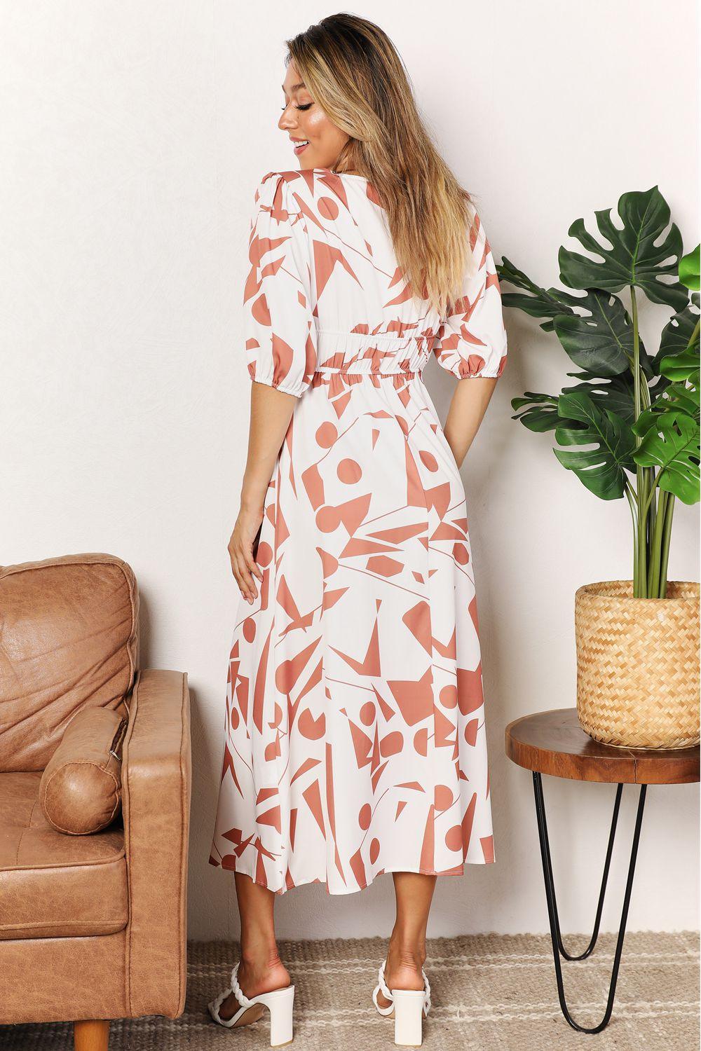 Get trendy with Printed Surplice Balloon Sleeve Dress - Dress available at Styles Code. Grab yours today!