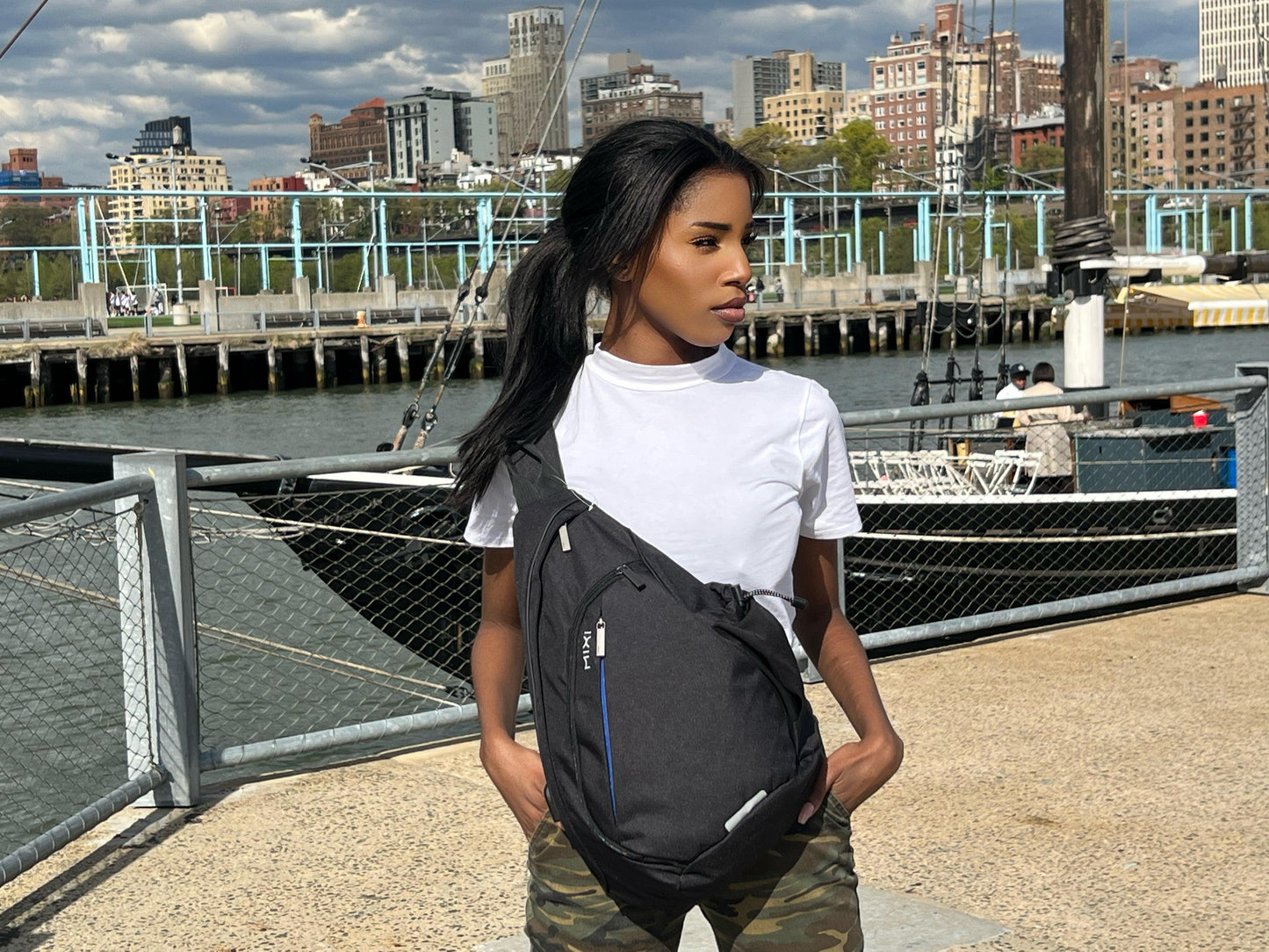 Get trendy with Mixi Sling Backpack with USB Port & Power Charger - Bags available at Styles Code. Grab yours today!