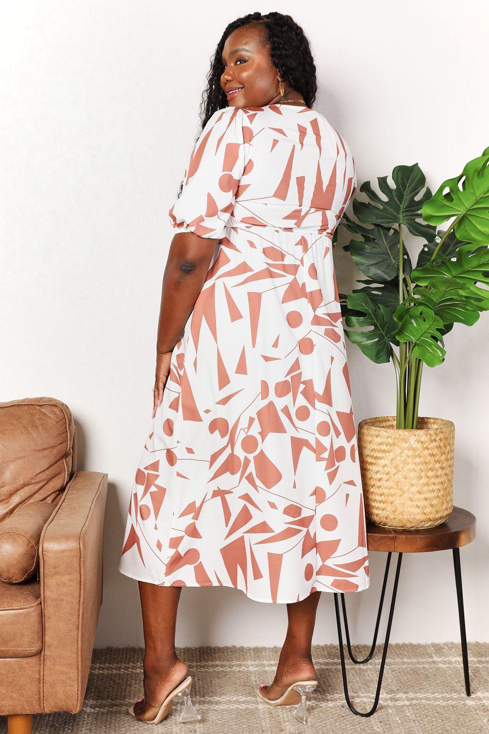Get trendy with Printed Surplice Balloon Sleeve Dress - Dress available at Styles Code. Grab yours today!