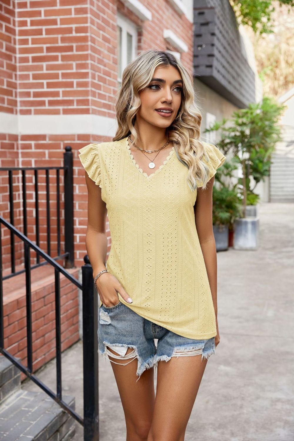 Get trendy with Flutter Sleeve Scalloped V-Neck Top - Blouse available at Styles Code. Grab yours today!