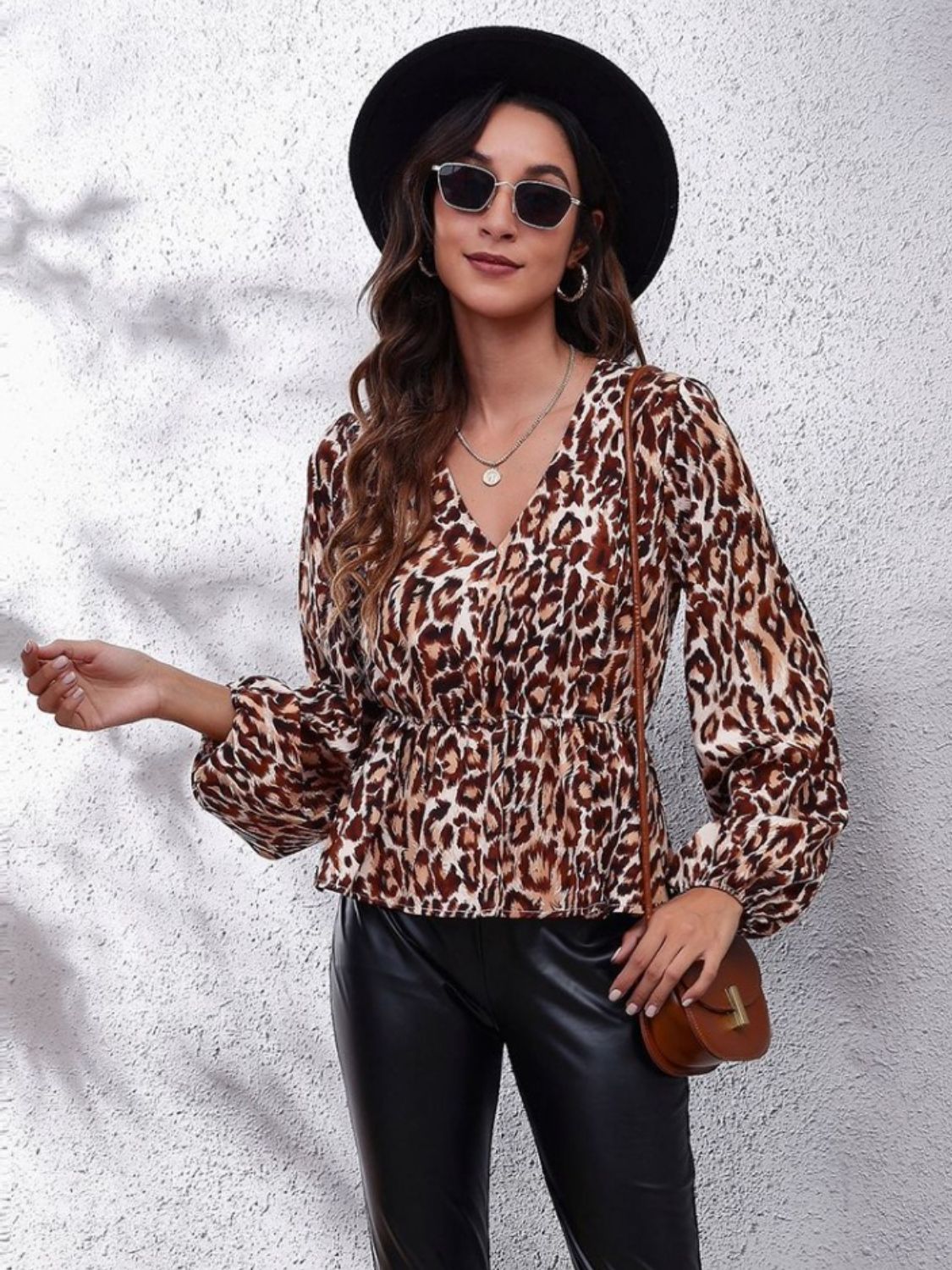 Get trendy with Ruched Printed V-Neck Blouse - Blouse available at Styles Code. Grab yours today!