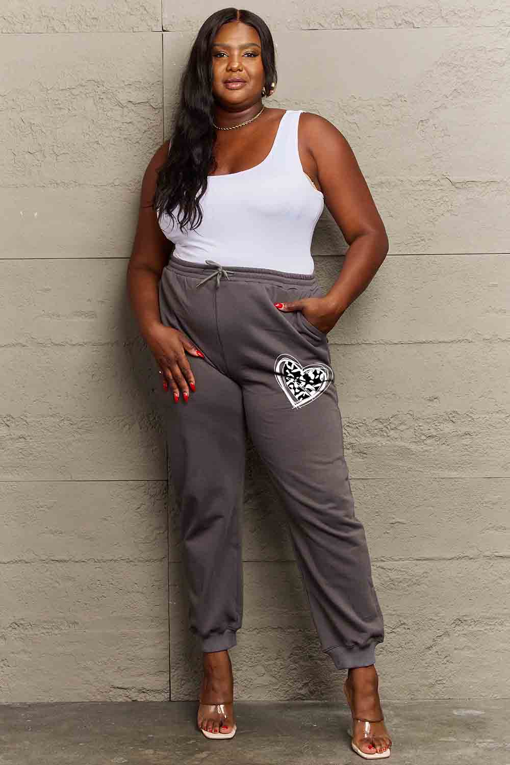 Get trendy with Full Size Drawstring Sweatpants - Joggers available at Styles Code. Grab yours today!