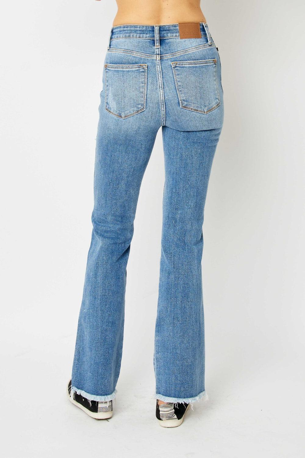Get trendy with Full Size Distressed Raw Hem Bootcut Jeans - Plus Size available at Styles Code. Grab yours today!