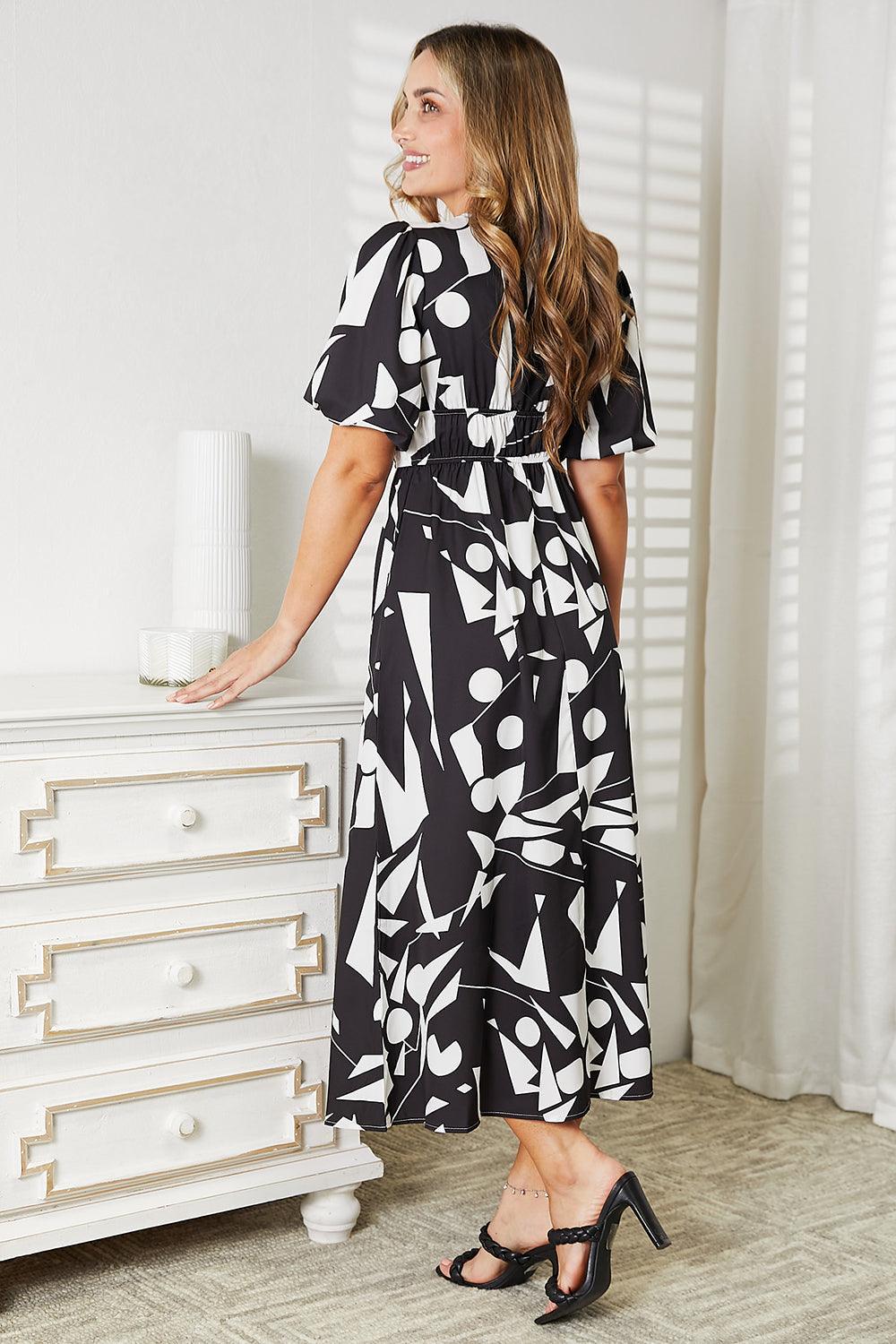 Get trendy with Double Take Printed Surplice Balloon Sleeve Dress - Dress available at Styles Code. Grab yours today!