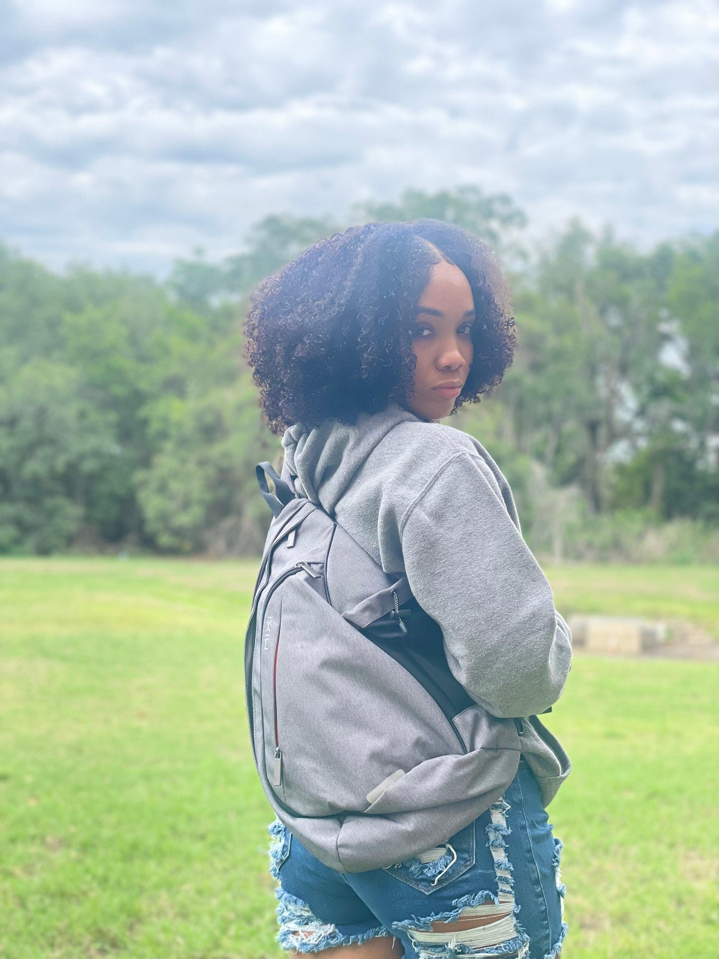 Get trendy with Mixi Sling Backpack with USB Port & Power Charger - Bags available at Styles Code. Grab yours today!