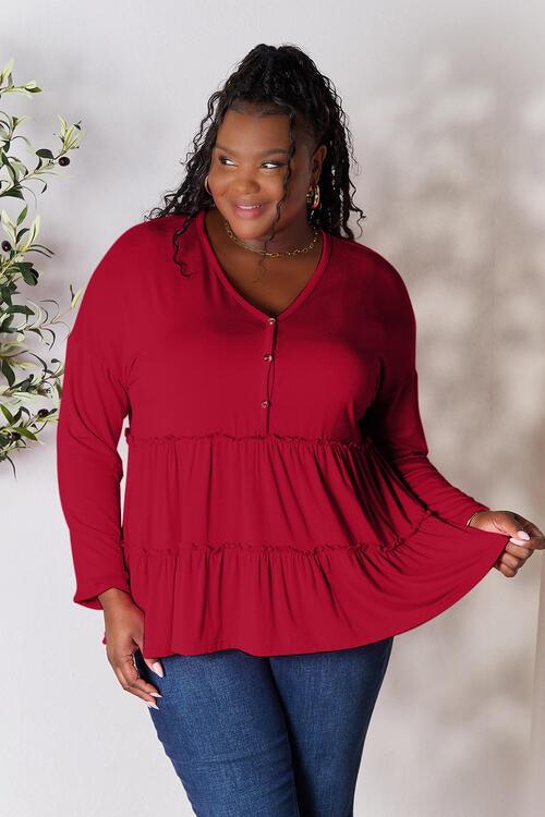 Get trendy with Half Button Ruffle Hem Blouse - Blouse available at Styles Code. Grab yours today!