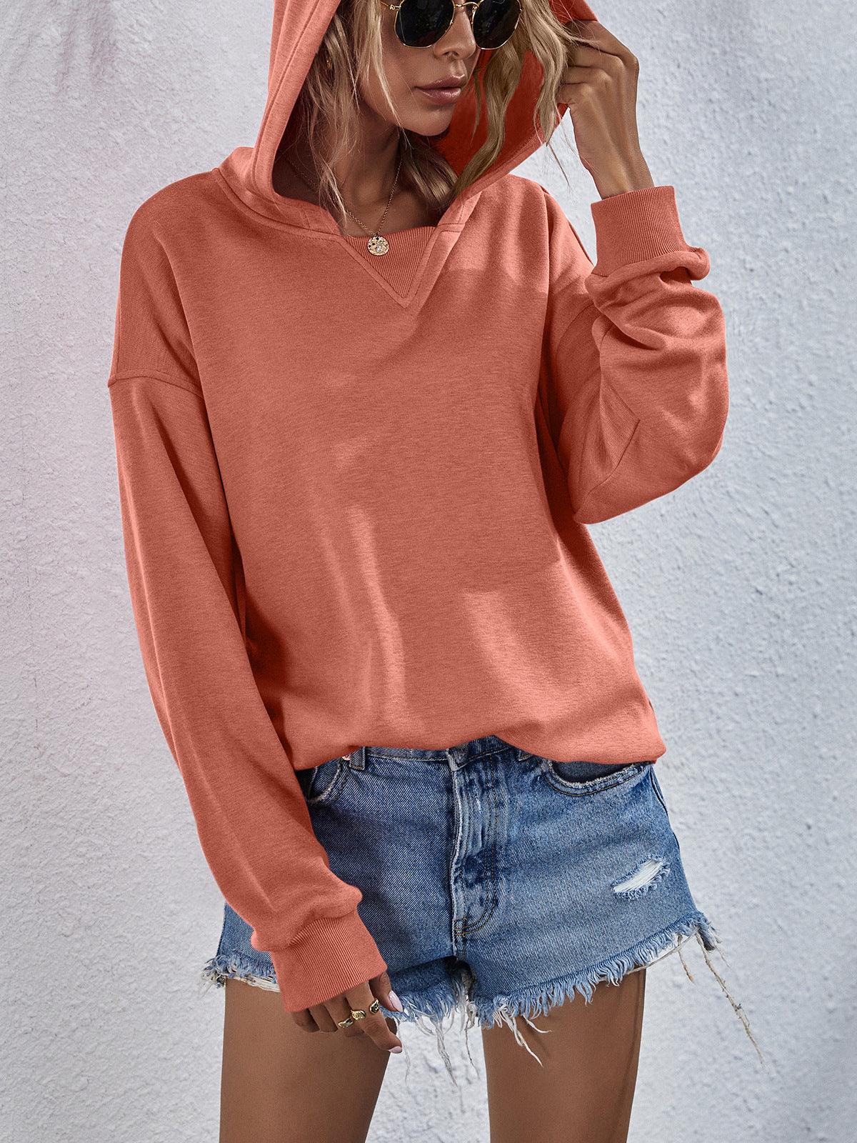 Get trendy with Dropped Shoulder Slit Hoodie - Tops available at Styles Code. Grab yours today!