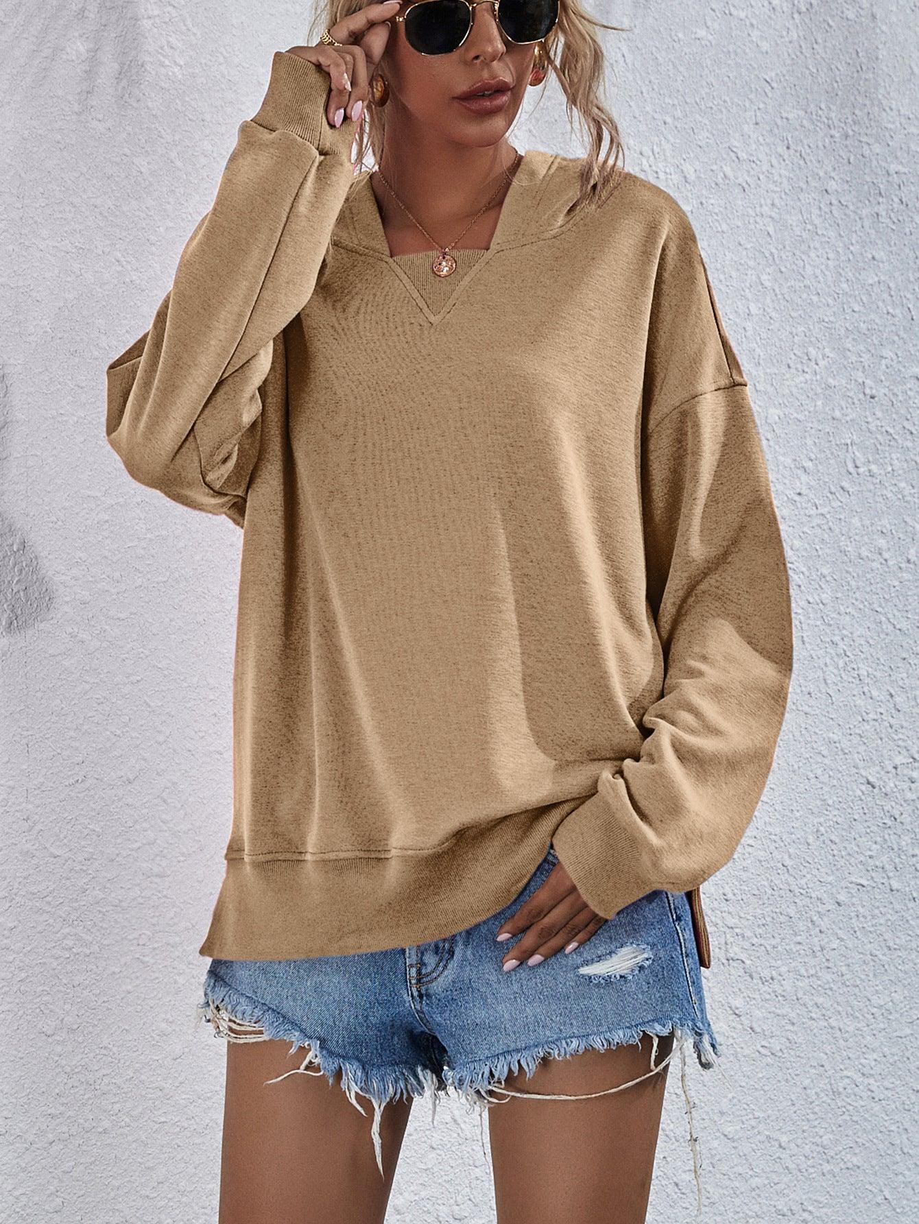 Get trendy with Dropped Shoulder Slit Hoodie - Tops available at Styles Code. Grab yours today!