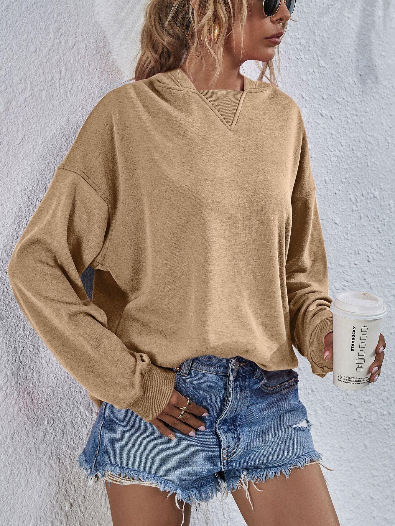 Get trendy with Dropped Shoulder Slit Hoodie - Tops available at Styles Code. Grab yours today!