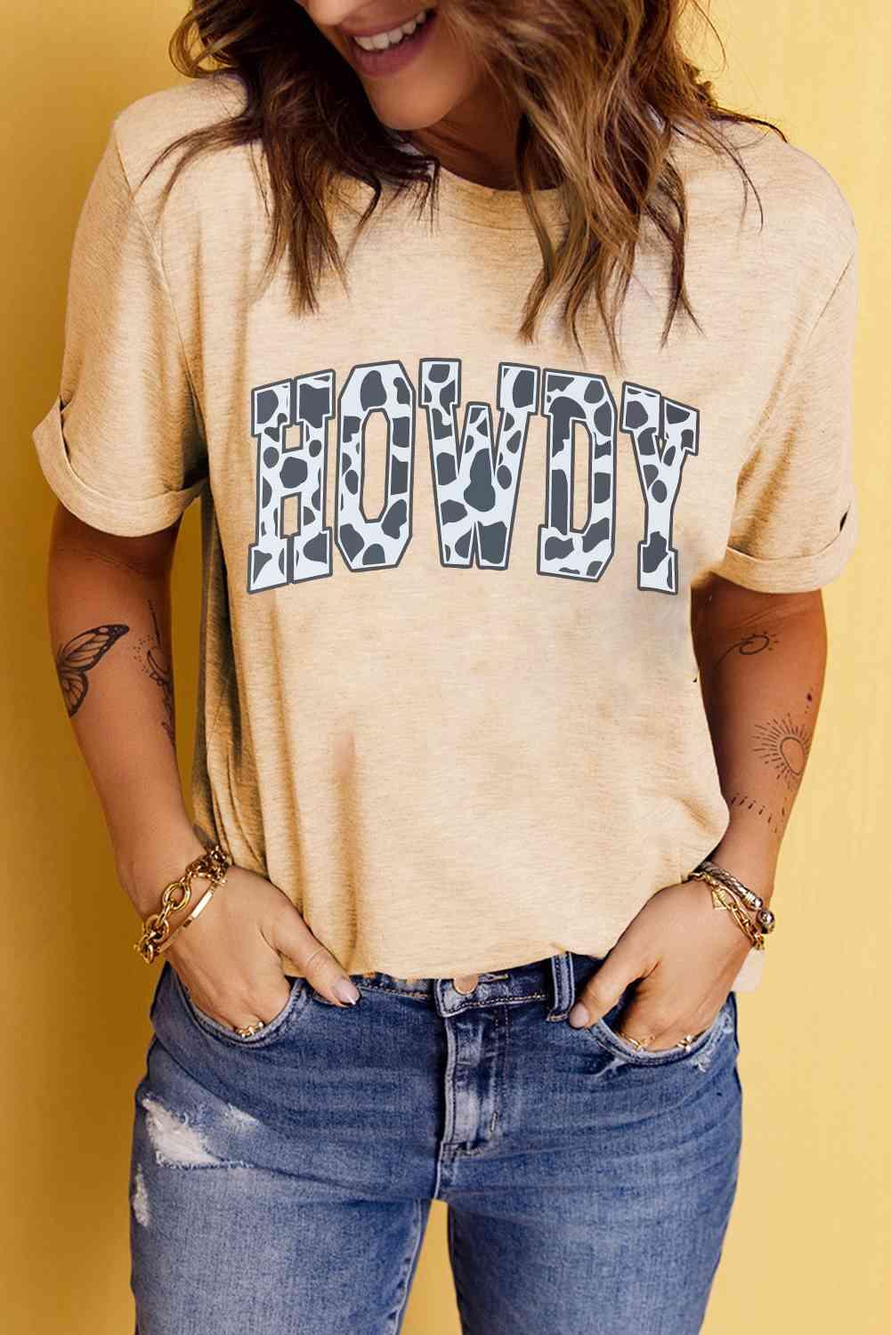 Get trendy with Round Neck Short Sleeve HOWDY Graphic Tee - T-Shirt available at Styles Code. Grab yours today!