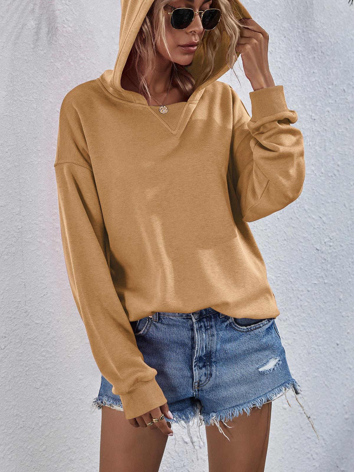 Get trendy with Dropped Shoulder Slit Hoodie - Tops available at Styles Code. Grab yours today!