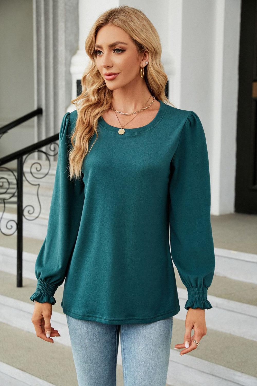 Get trendy with Round Neck Smocked Flounce Sleeve Blouse - Tops available at Styles Code. Grab yours today!