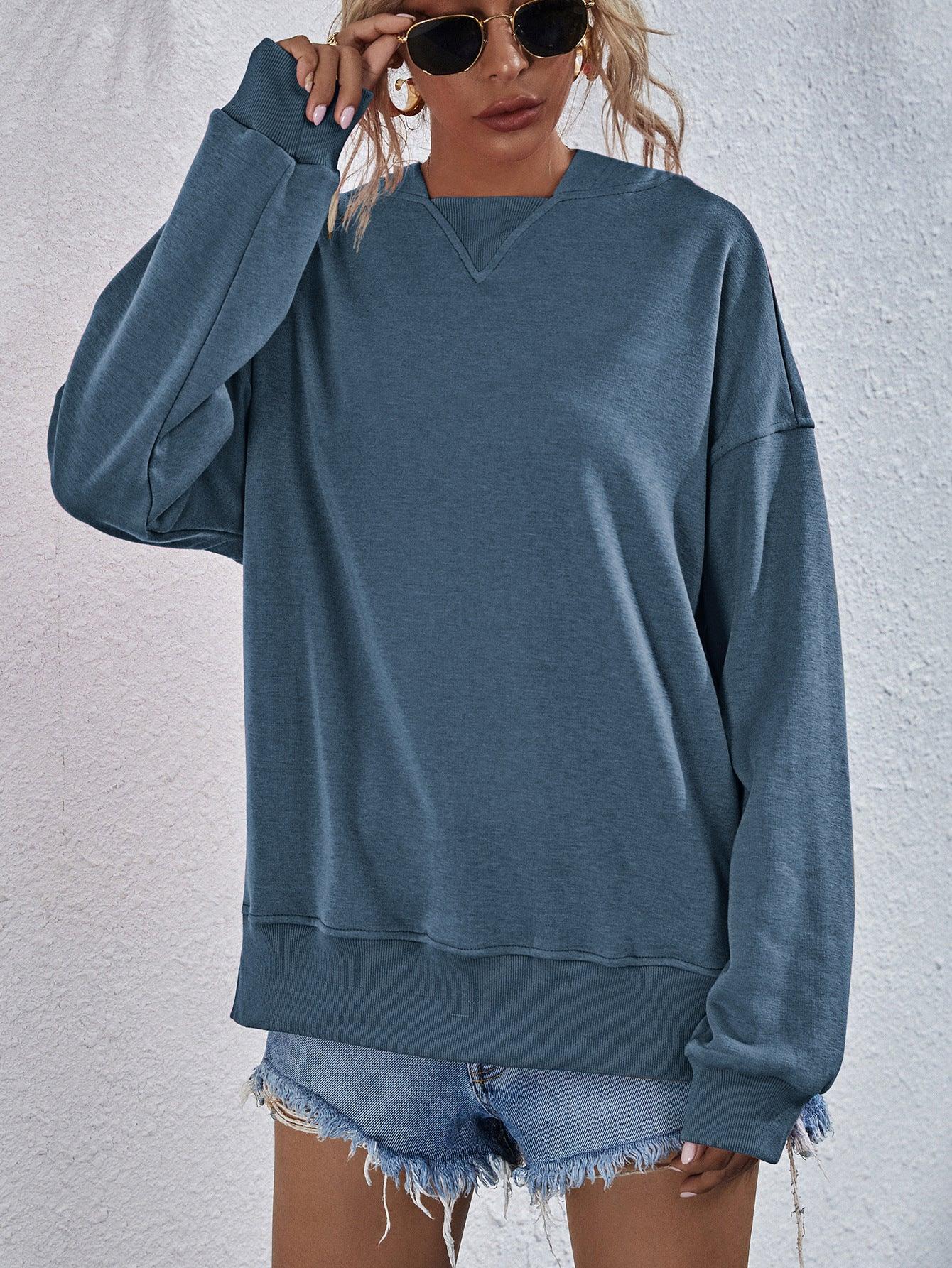 Get trendy with Dropped Shoulder Slit Hoodie - Tops available at Styles Code. Grab yours today!