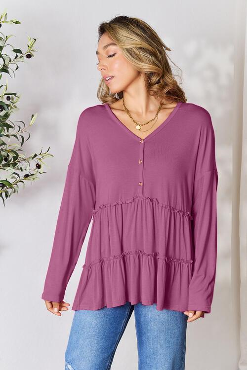 Get trendy with Half Button Ruffle Hem Blouse - Blouse available at Styles Code. Grab yours today!