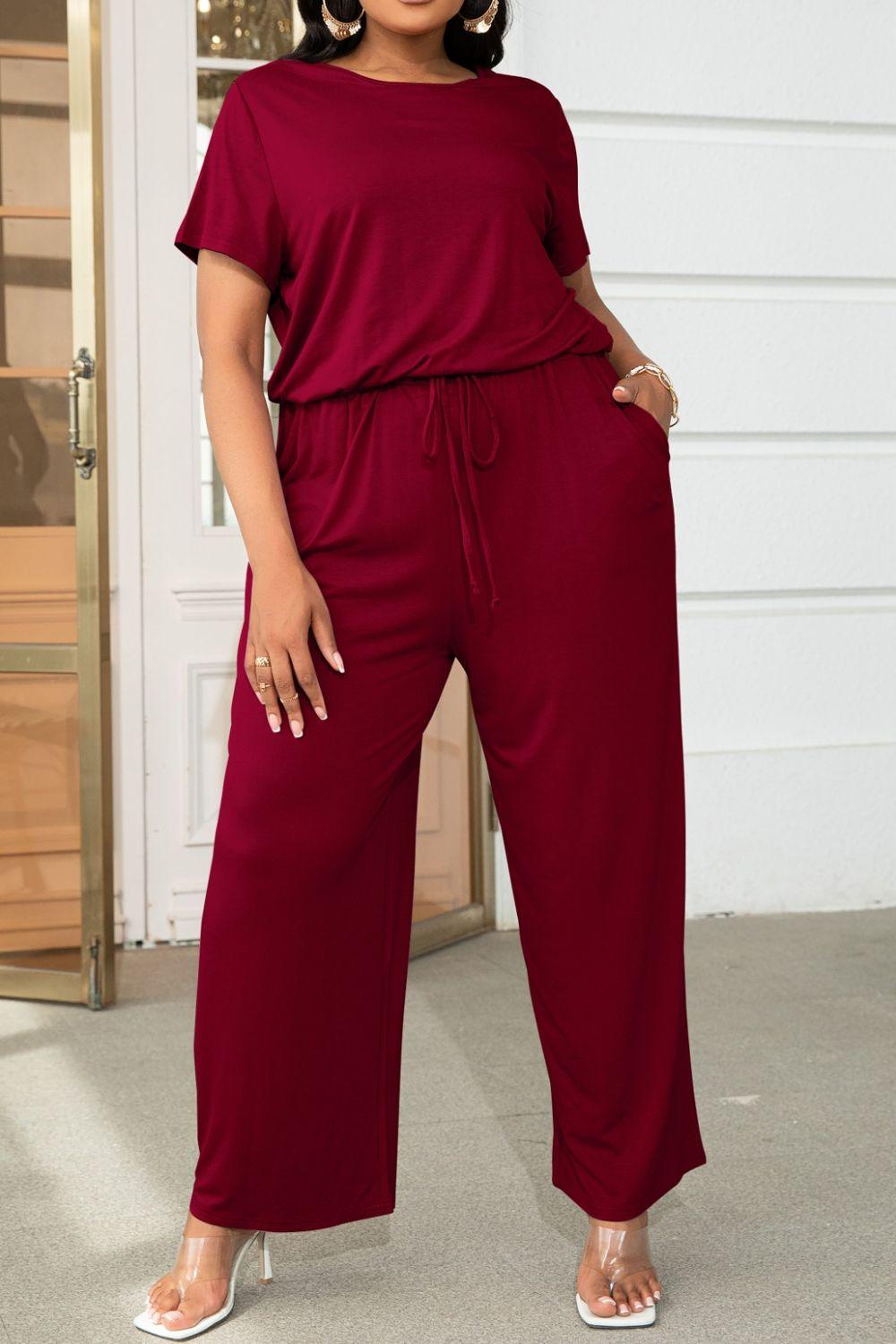 Get trendy with Plus Size Drawstring Waist Short Sleeve Jumpsuit - Plus size available at Styles Code. Grab yours today!