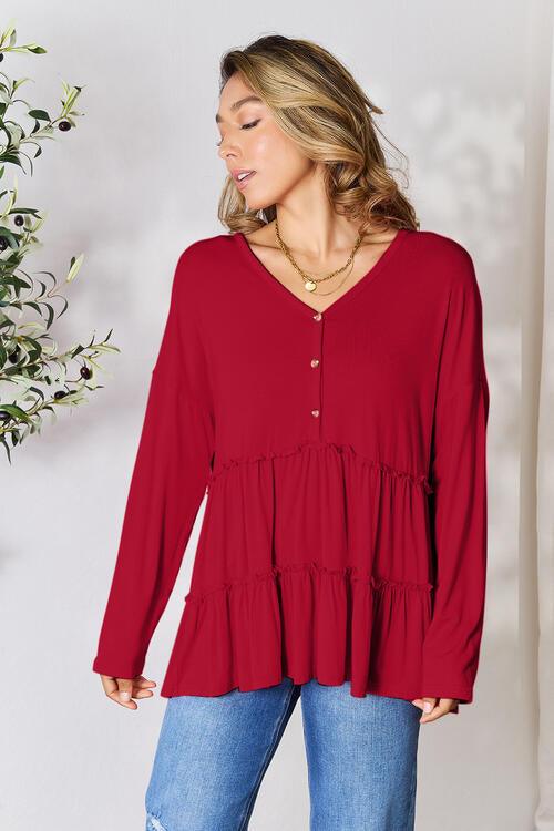 Get trendy with Half Button Ruffle Hem Blouse - Blouse available at Styles Code. Grab yours today!