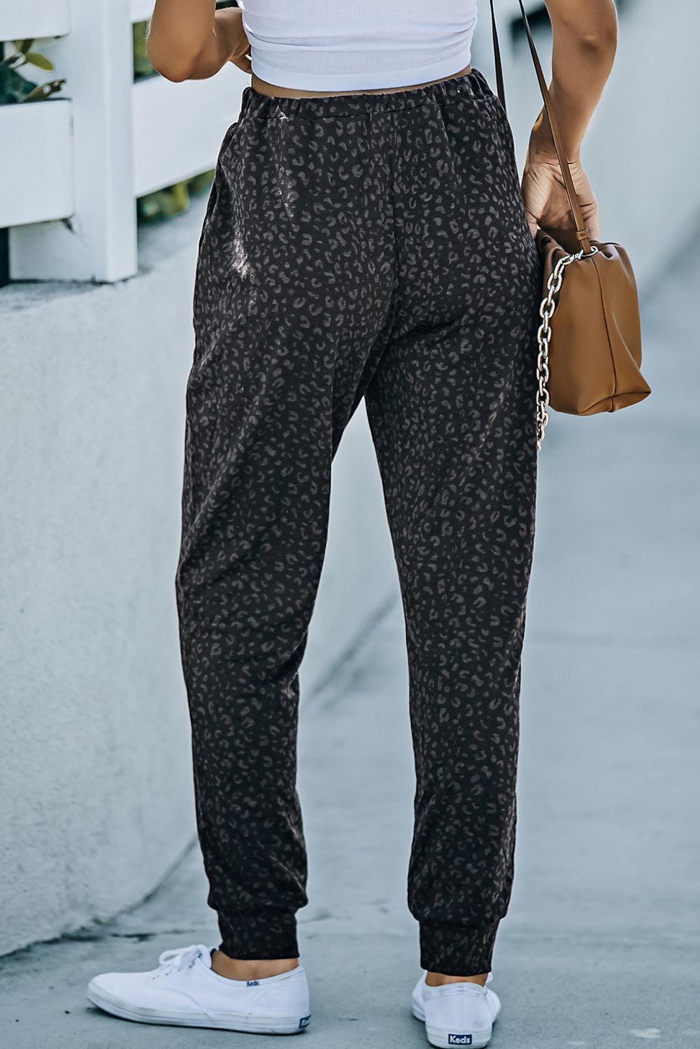 Get trendy with Double Take Leopard Print Joggers with Pockets - Joggers available at Styles Code. Grab yours today!