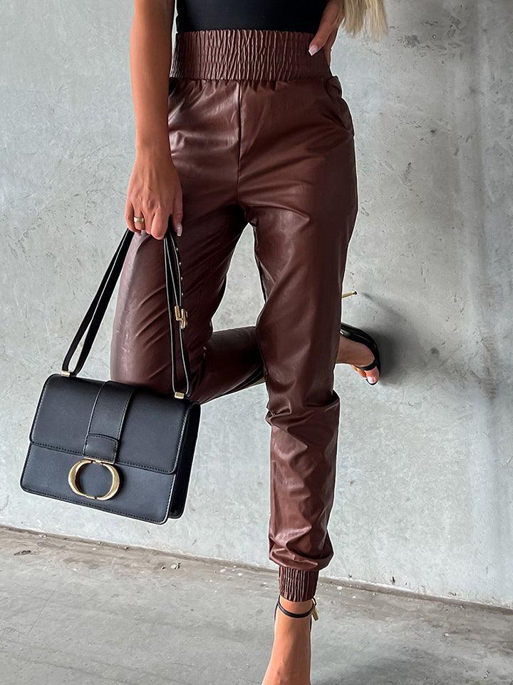 Get trendy with Smocked Waist Long Pants - Bottoms available at Styles Code. Grab yours today!