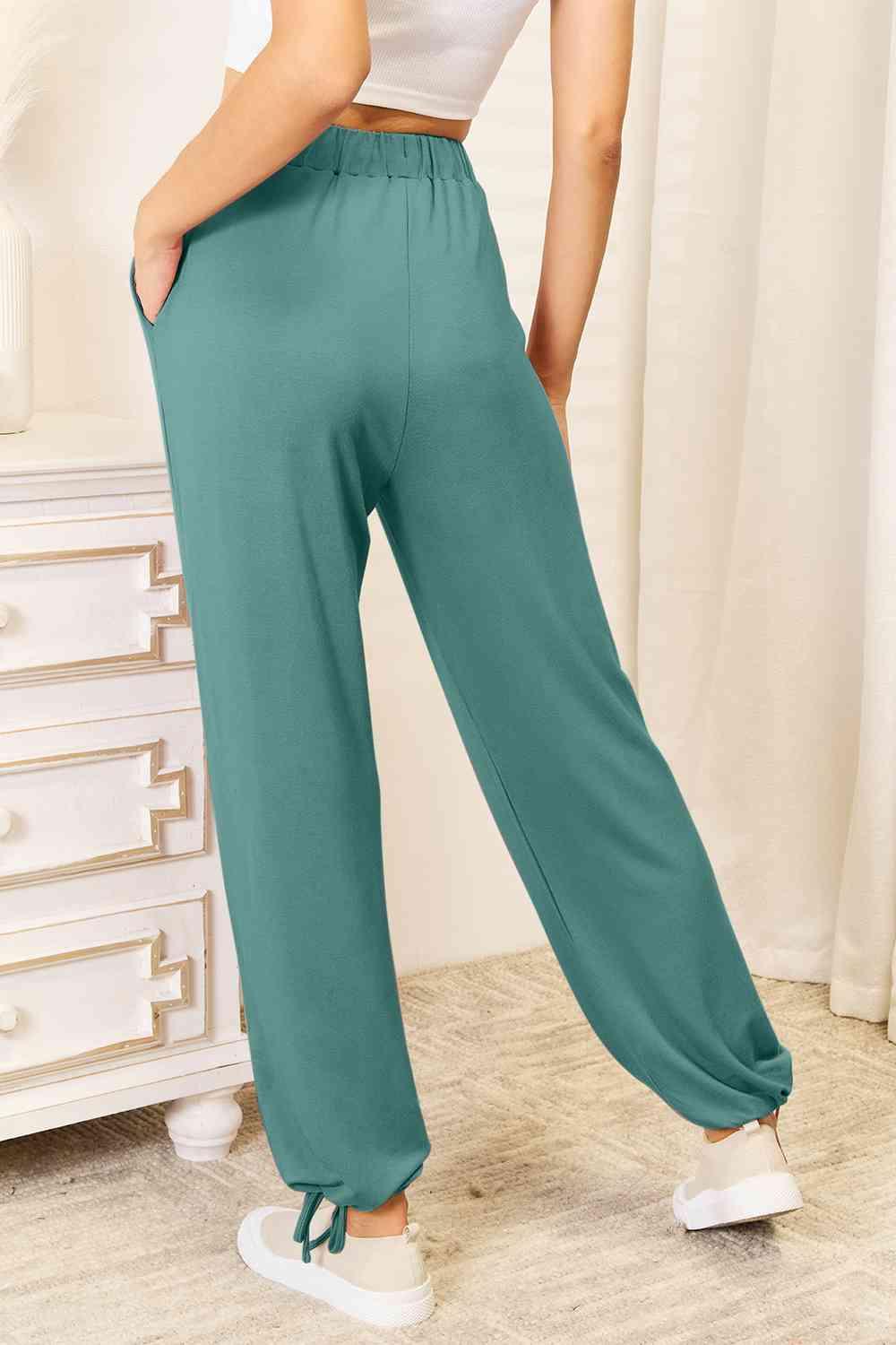 Get trendy with Full Size Rayon Drawstring Pants - Bottoms available at Styles Code. Grab yours today!