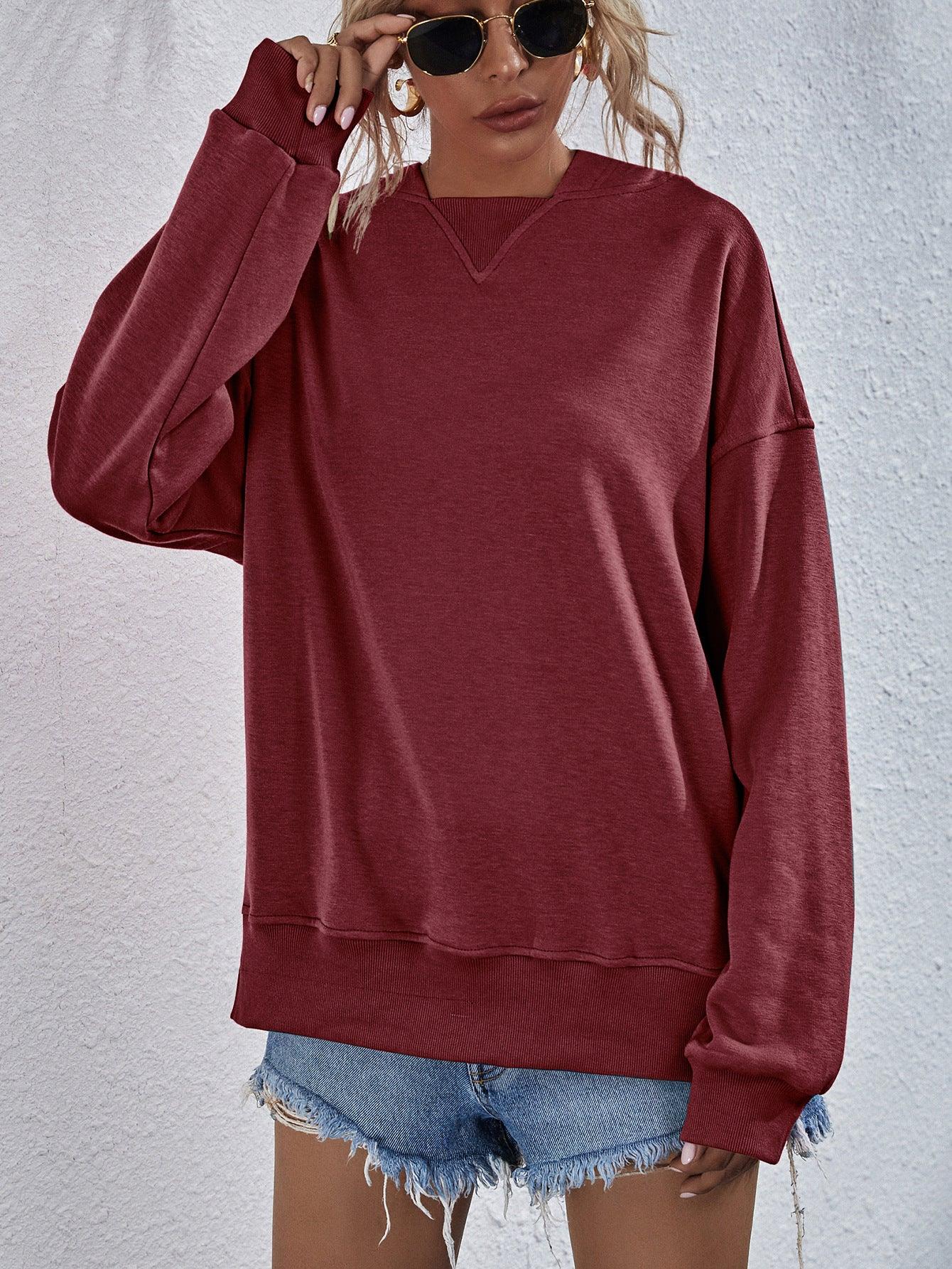 Get trendy with Dropped Shoulder Slit Hoodie - Tops available at Styles Code. Grab yours today!