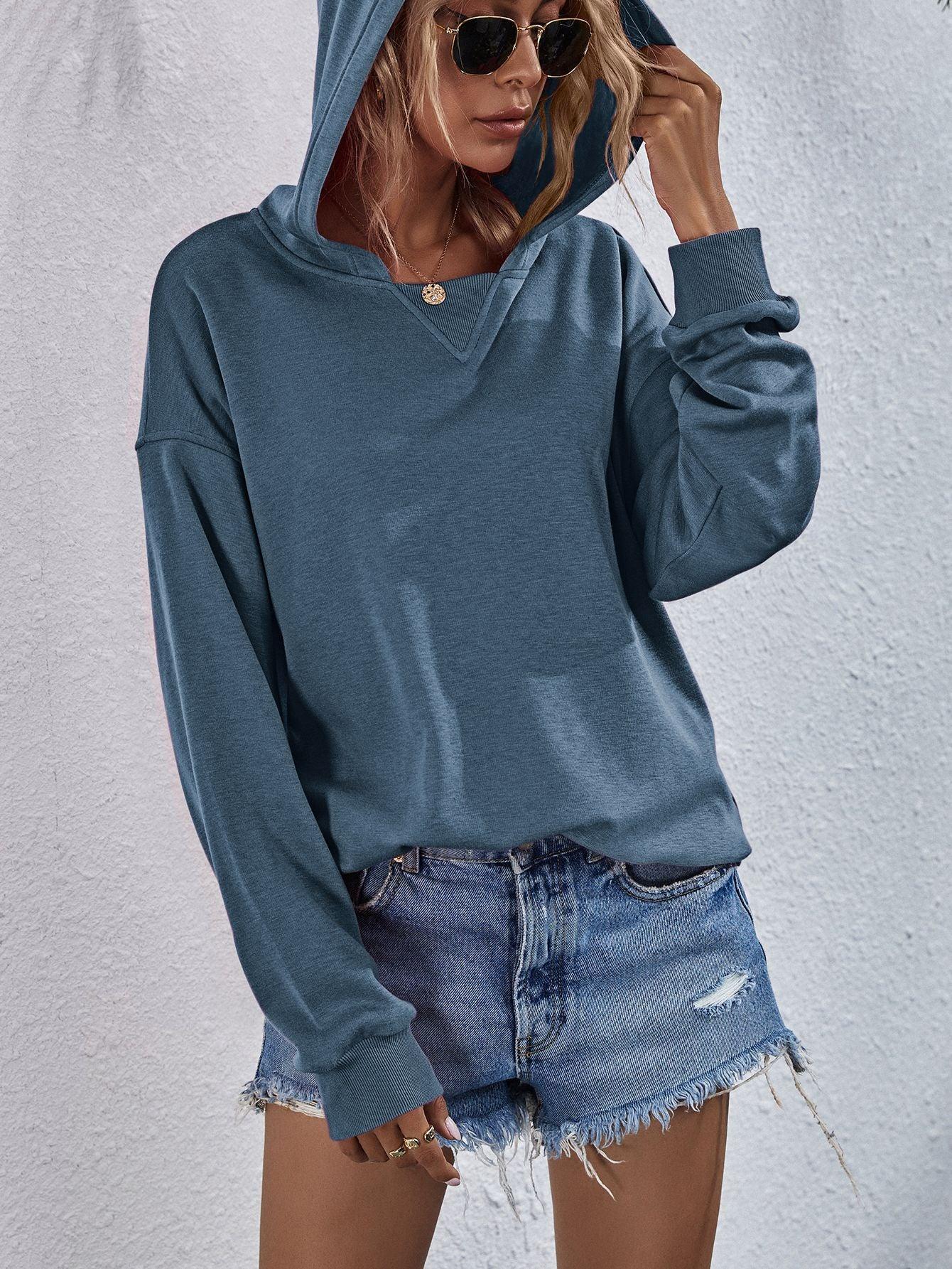 Get trendy with Dropped Shoulder Slit Hoodie - Tops available at Styles Code. Grab yours today!