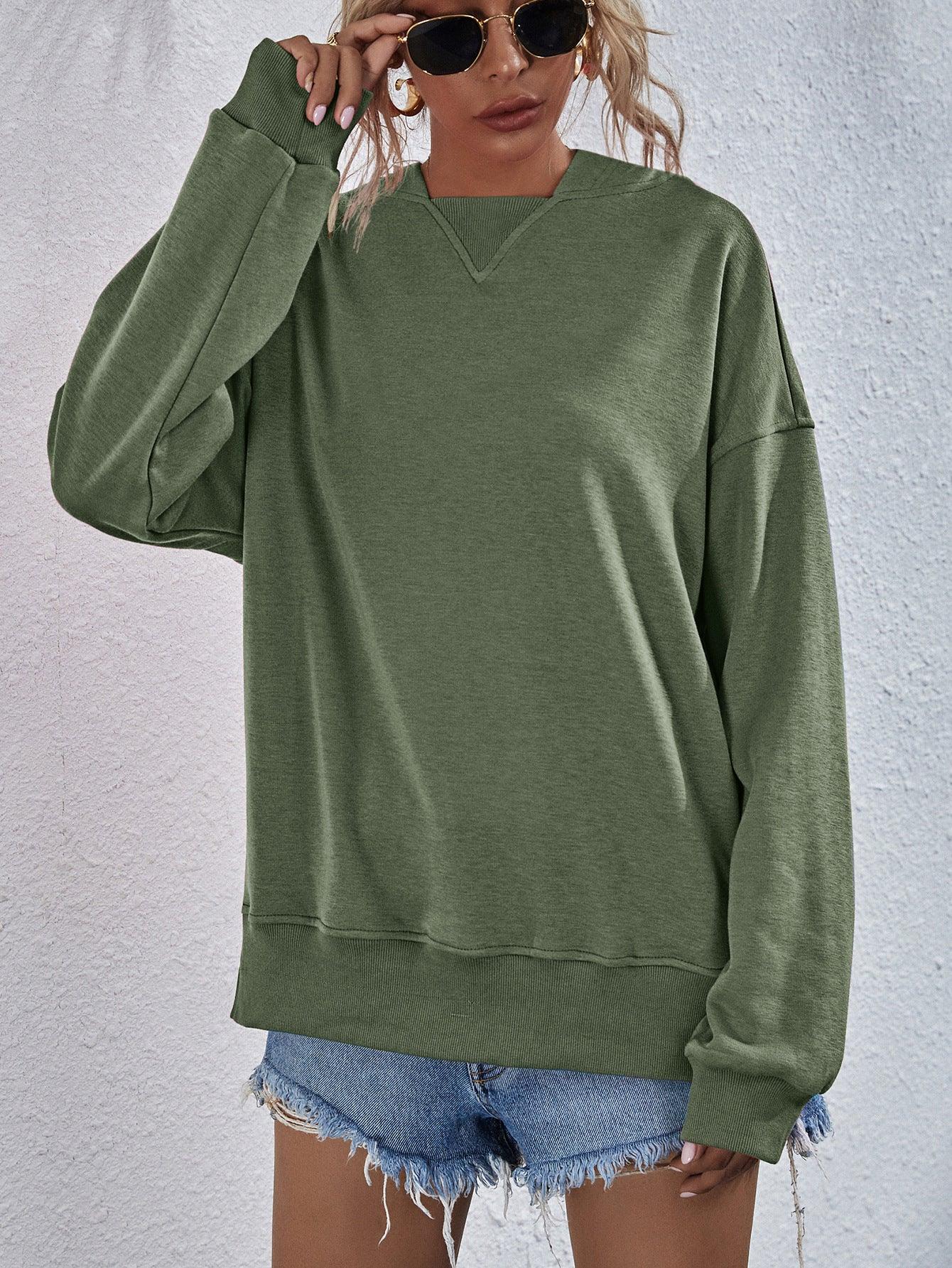 Get trendy with Dropped Shoulder Slit Hoodie - Tops available at Styles Code. Grab yours today!