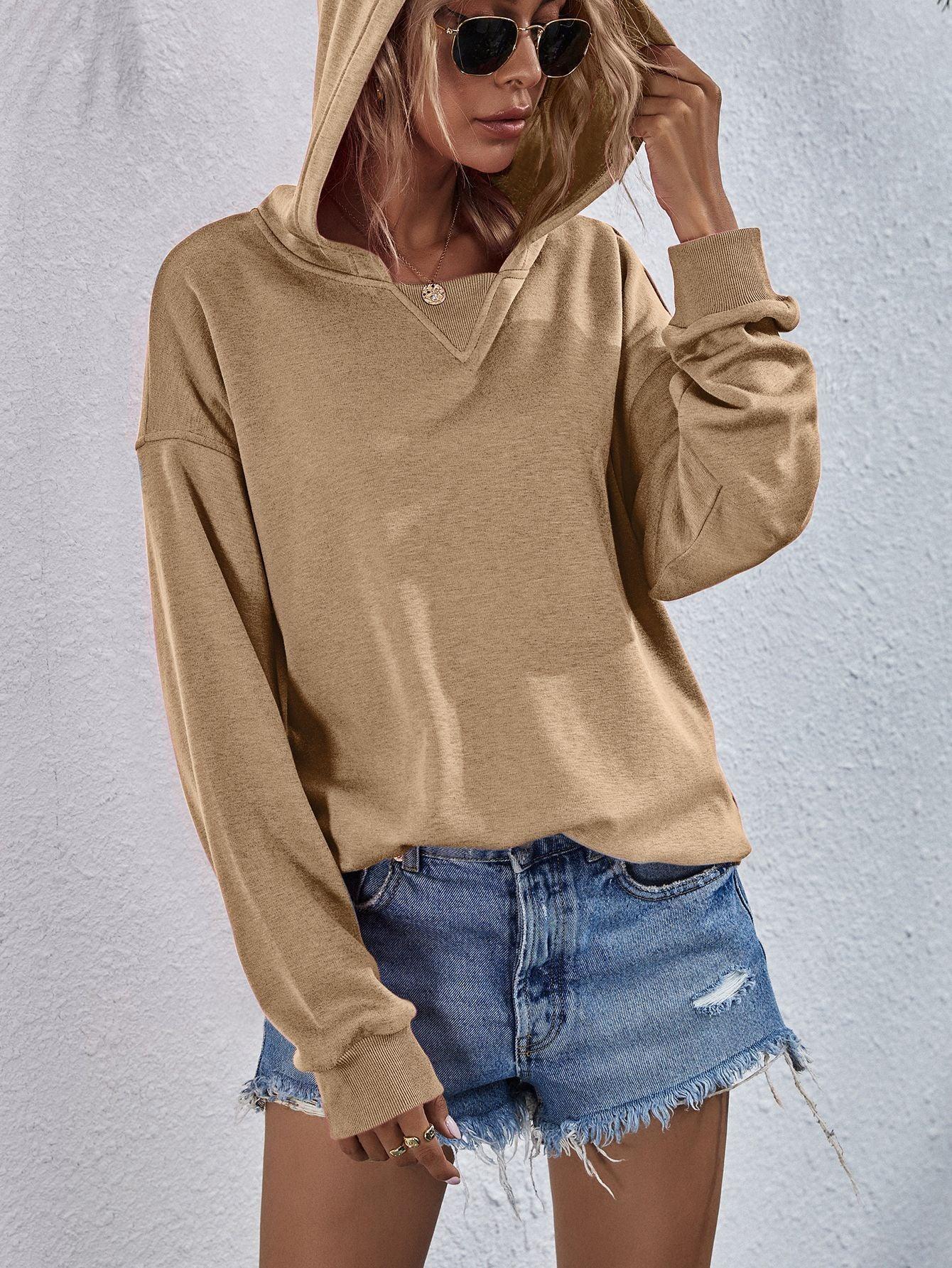 Get trendy with Dropped Shoulder Slit Hoodie - Tops available at Styles Code. Grab yours today!