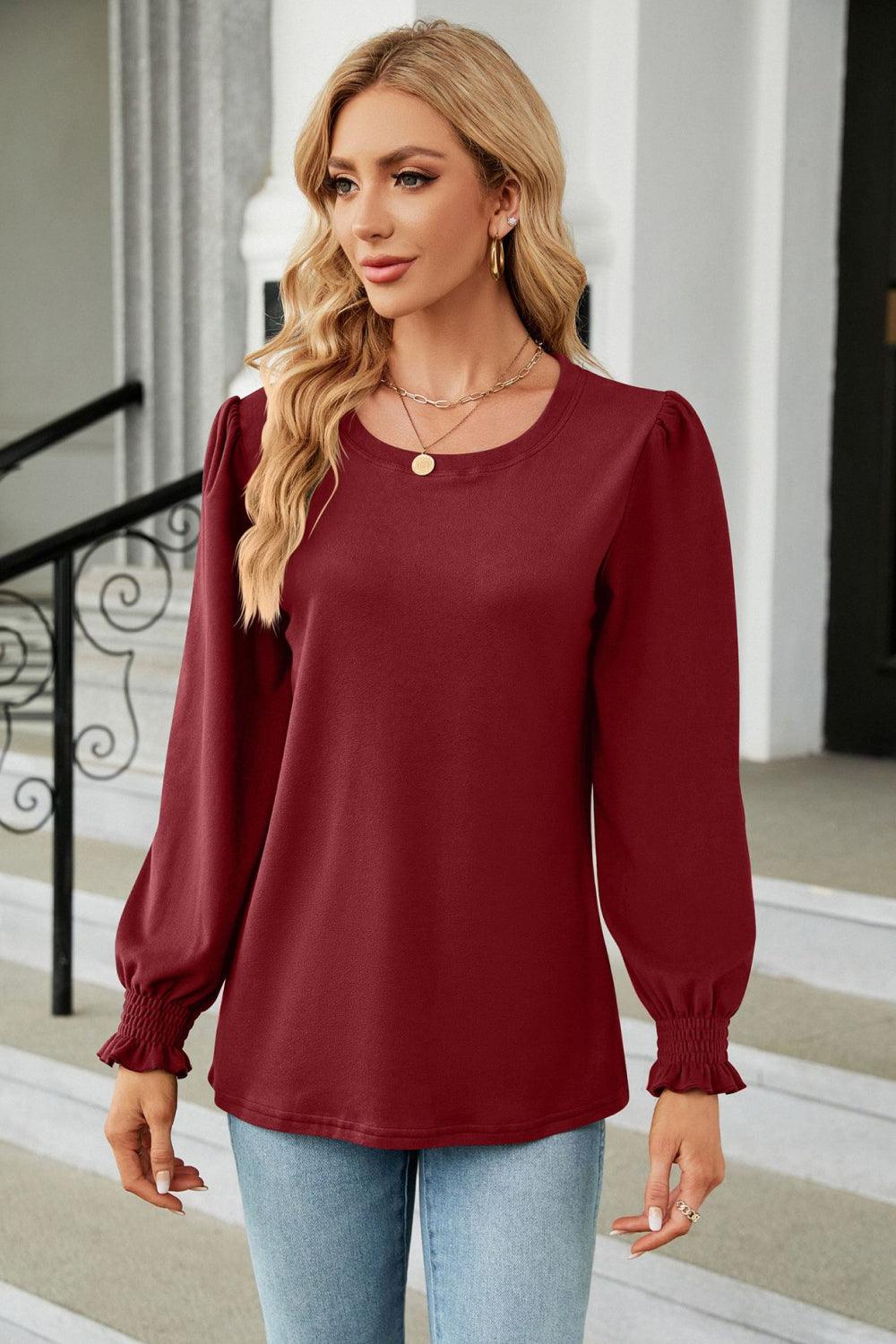 Get trendy with Round Neck Smocked Flounce Sleeve Blouse - Tops available at Styles Code. Grab yours today!